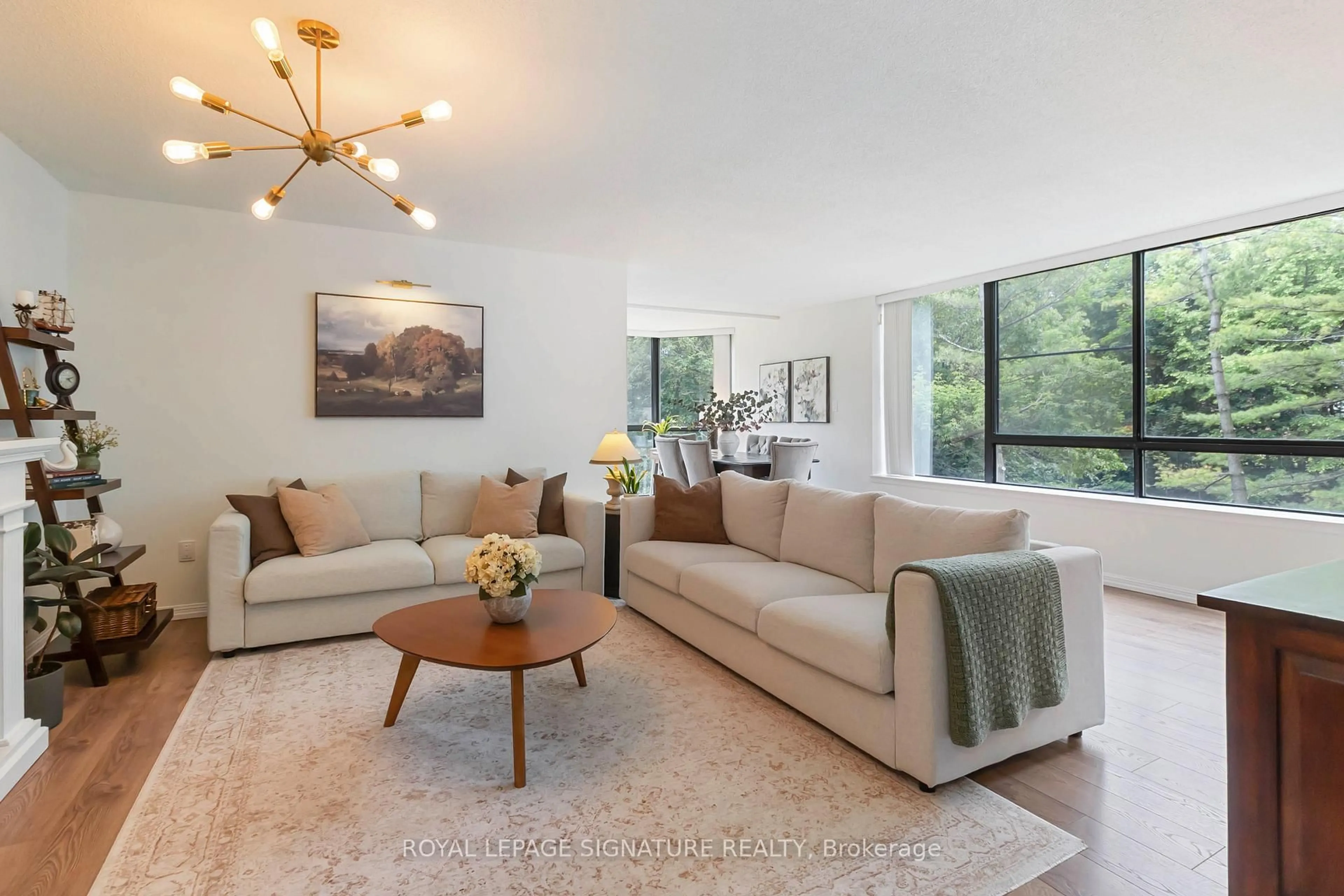 Living room with furniture, unknown for 1230 Marlborough Crt #204, Oakville Ontario L6H 3K6