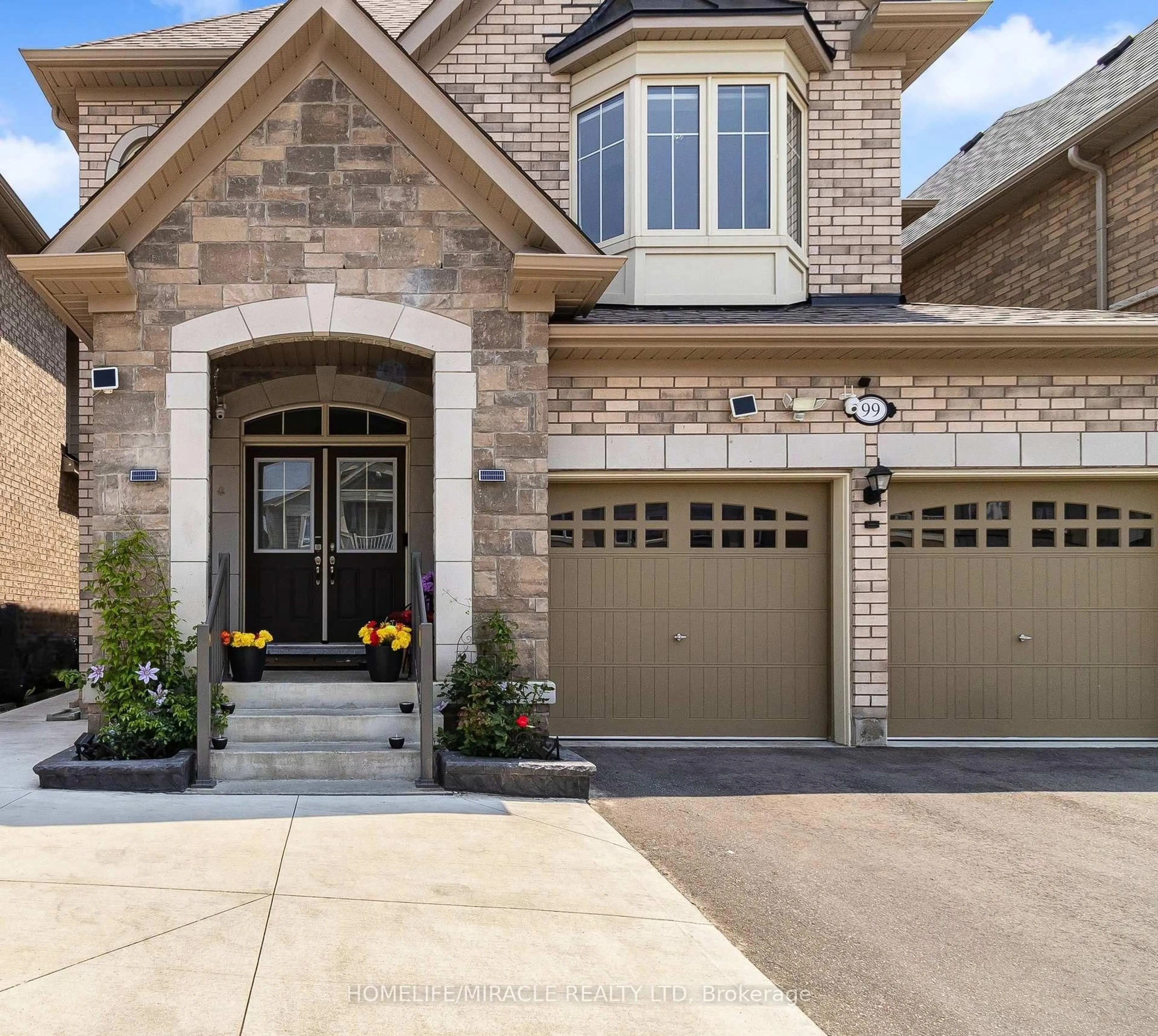 Home with brick exterior material, street for 99 Benhurst Cres, Brampton Ontario L7A 5A4