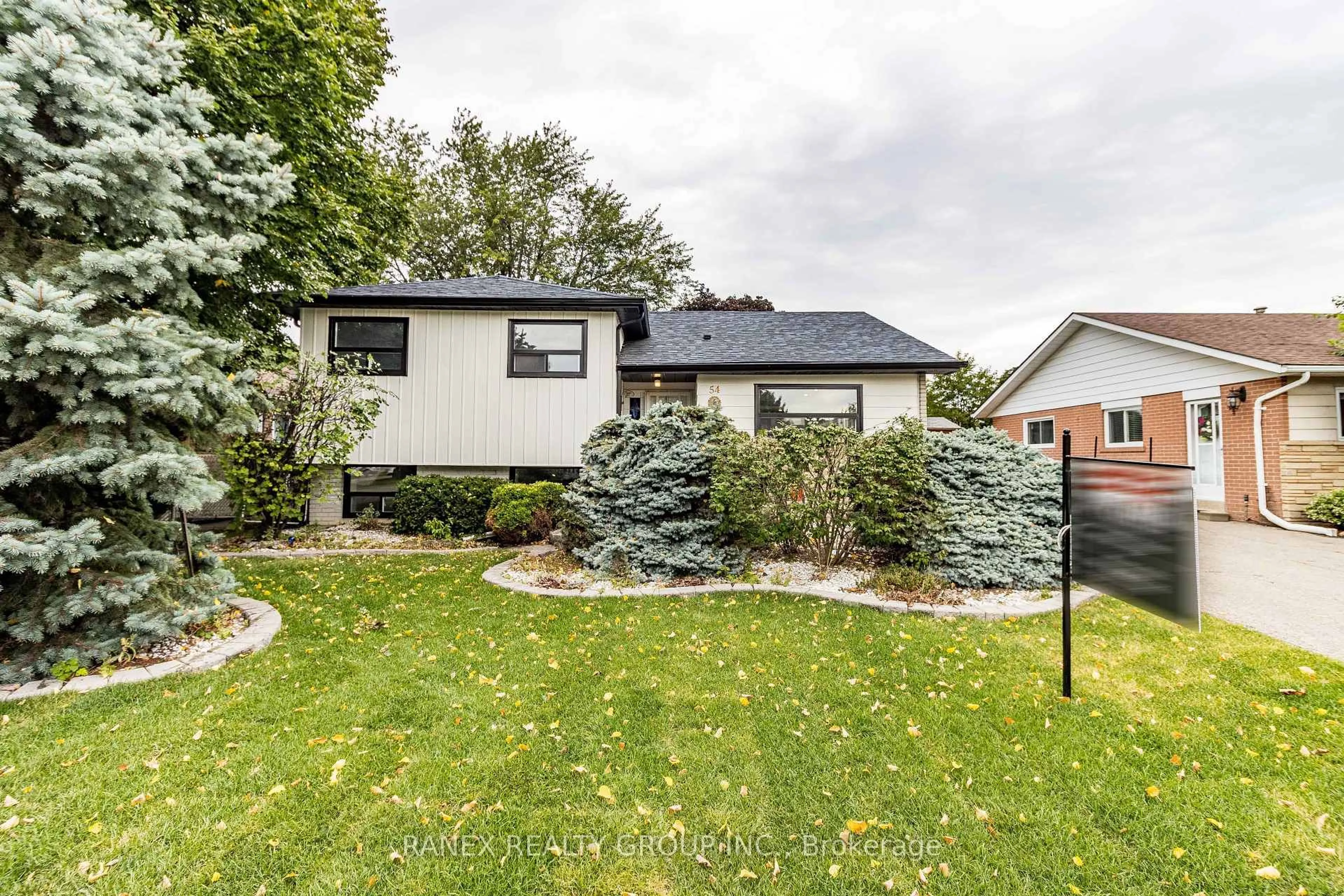Home with vinyl exterior material, street for 54 Flowertown Ave, Brampton Ontario L6X 2K7