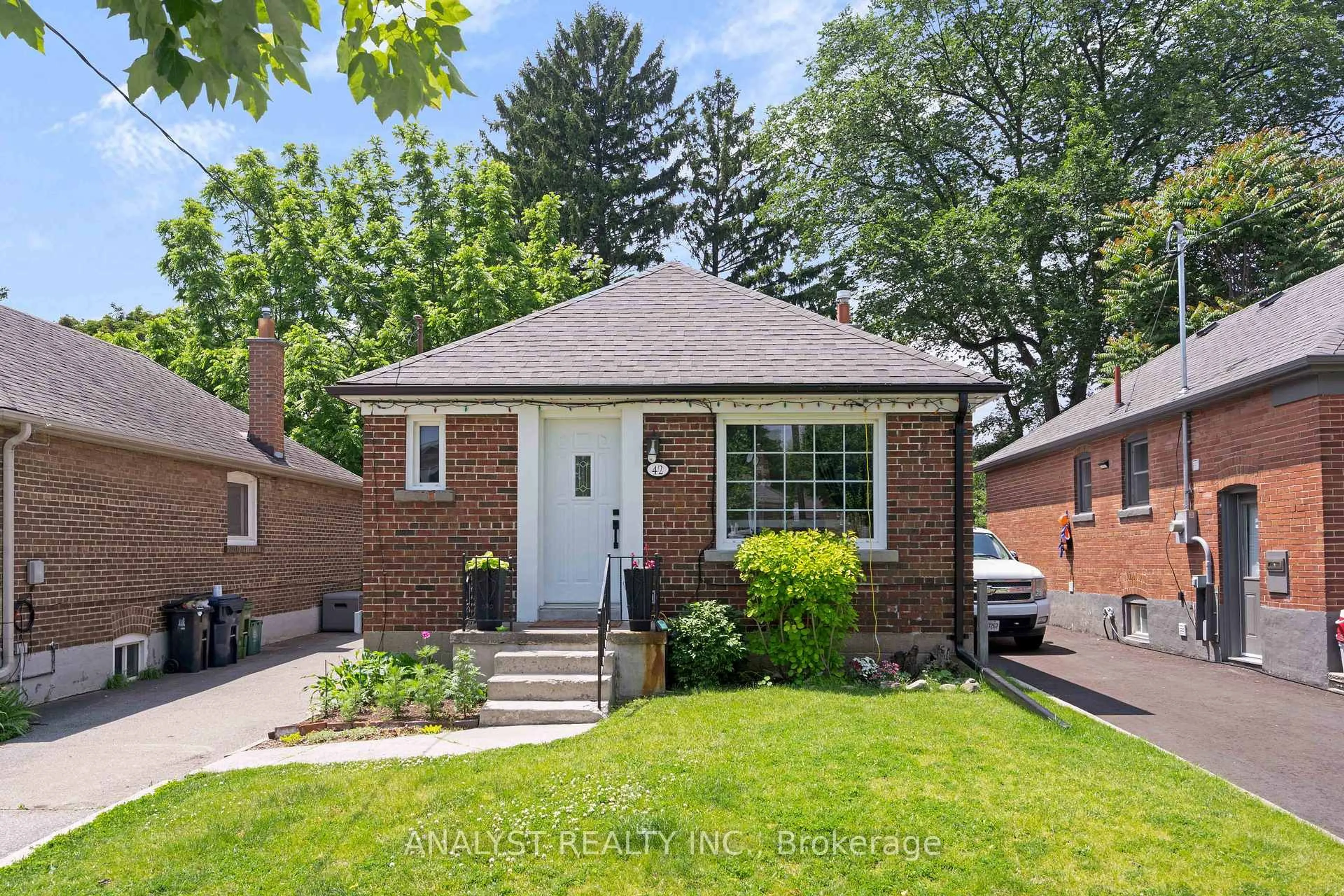 Home with brick exterior material, street for 42 Smithfield Dr, Toronto Ontario M8Y 3M2
