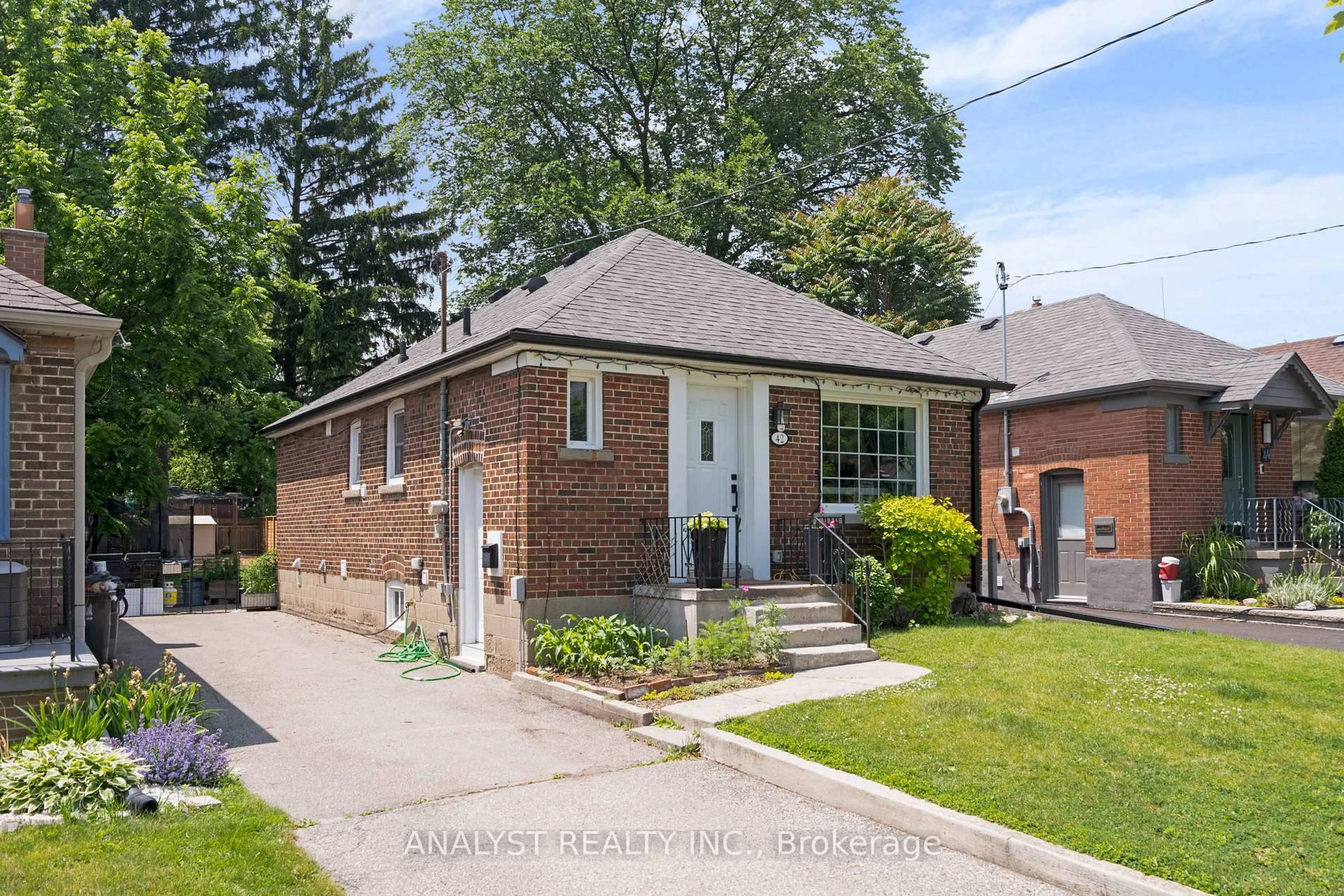 Home with brick exterior material, street for 42 Smithfield Dr, Toronto Ontario M8Y 3M2