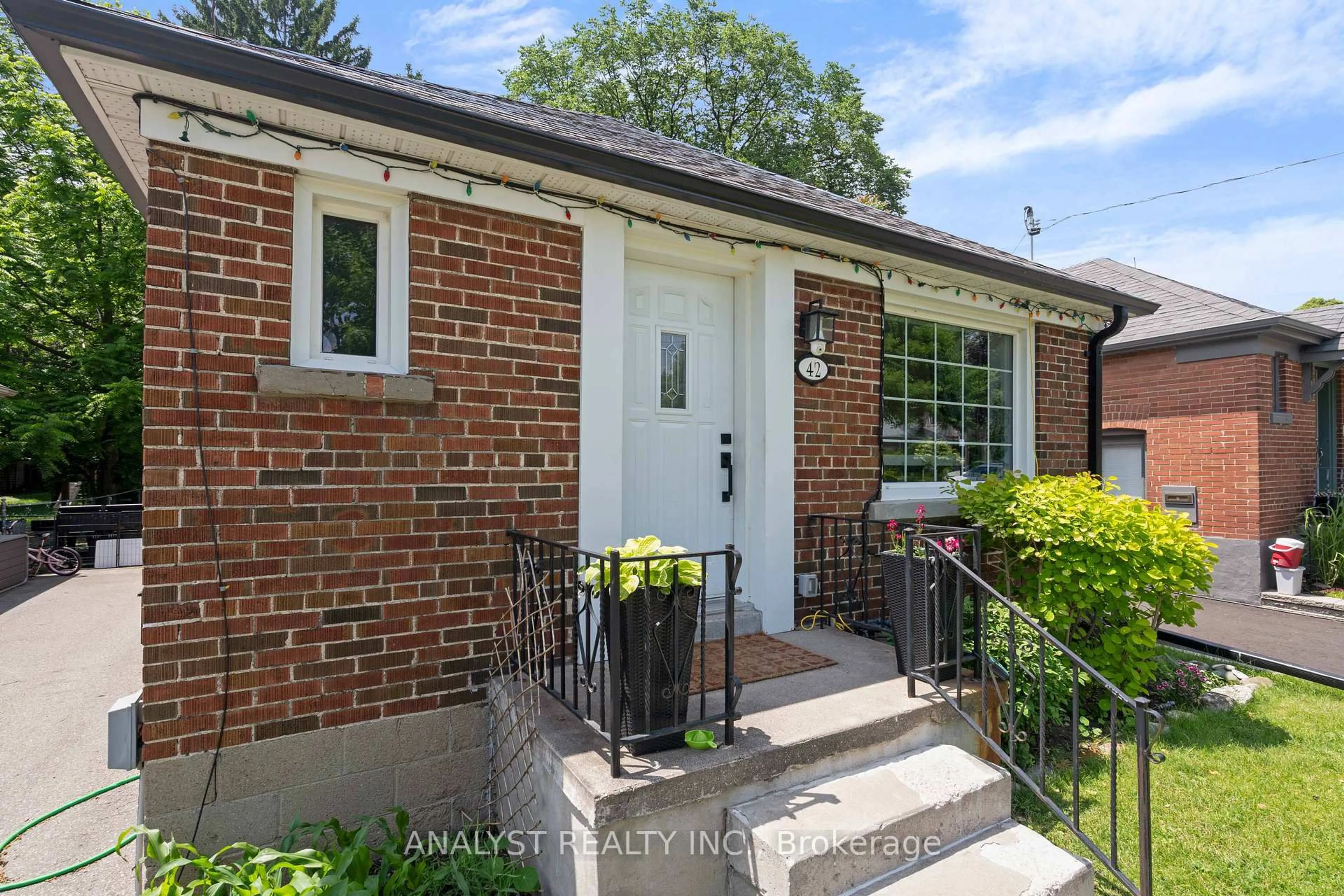 Home with brick exterior material, street for 42 Smithfield Dr, Toronto Ontario M8Y 3M2