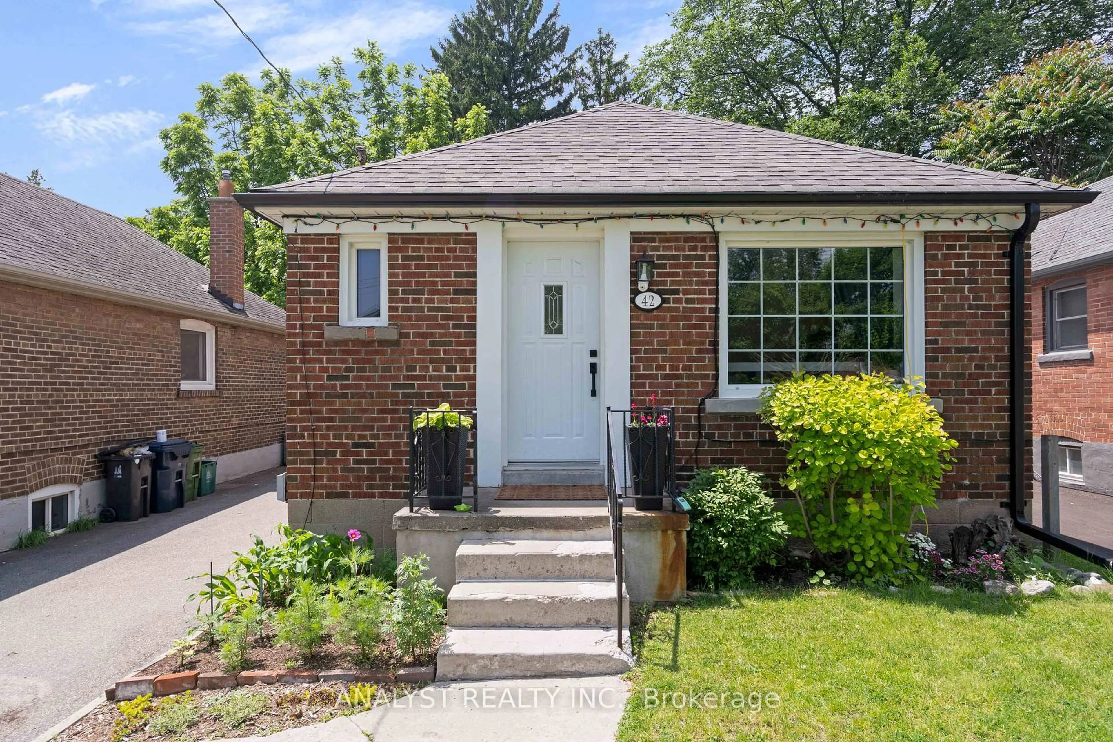 Home with brick exterior material, street for 42 Smithfield Dr, Toronto Ontario M8Y 3M2
