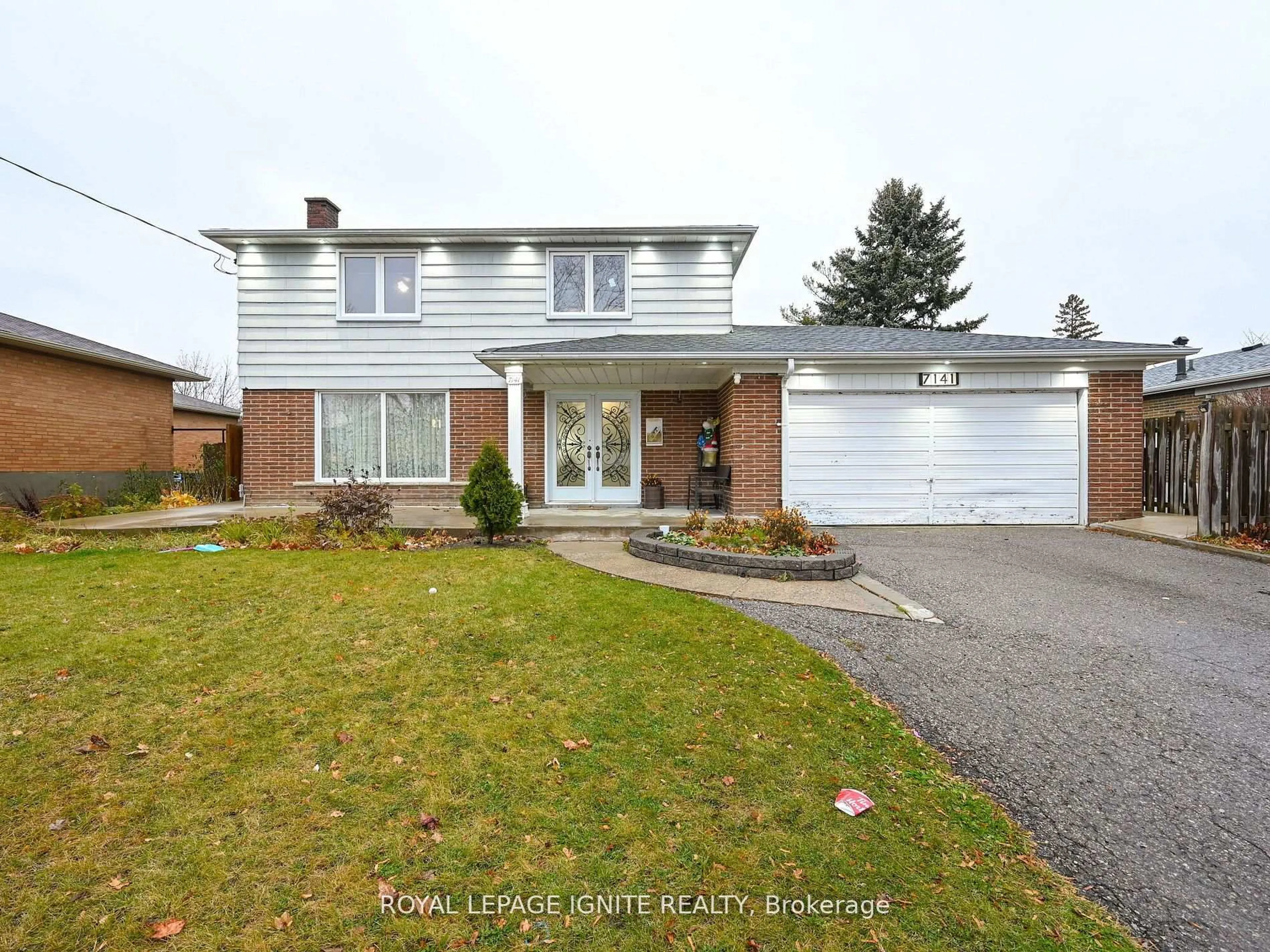 Home with brick exterior material, street for 7141 Harwick Dr, Mississauga Ontario L4T 3A5