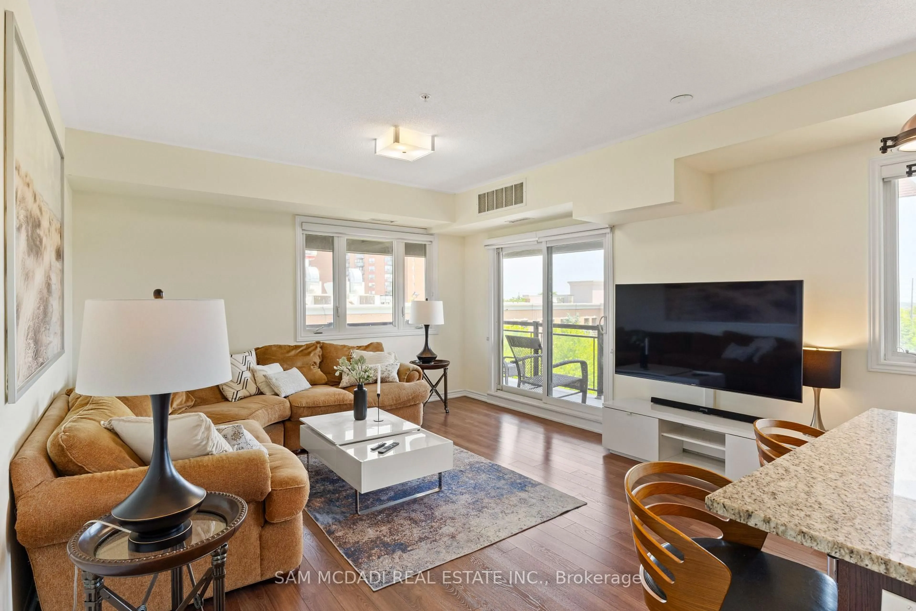 Living room with furniture, unknown for 570 Lolita Gdns #413, Mississauga Ontario L5A 0A1