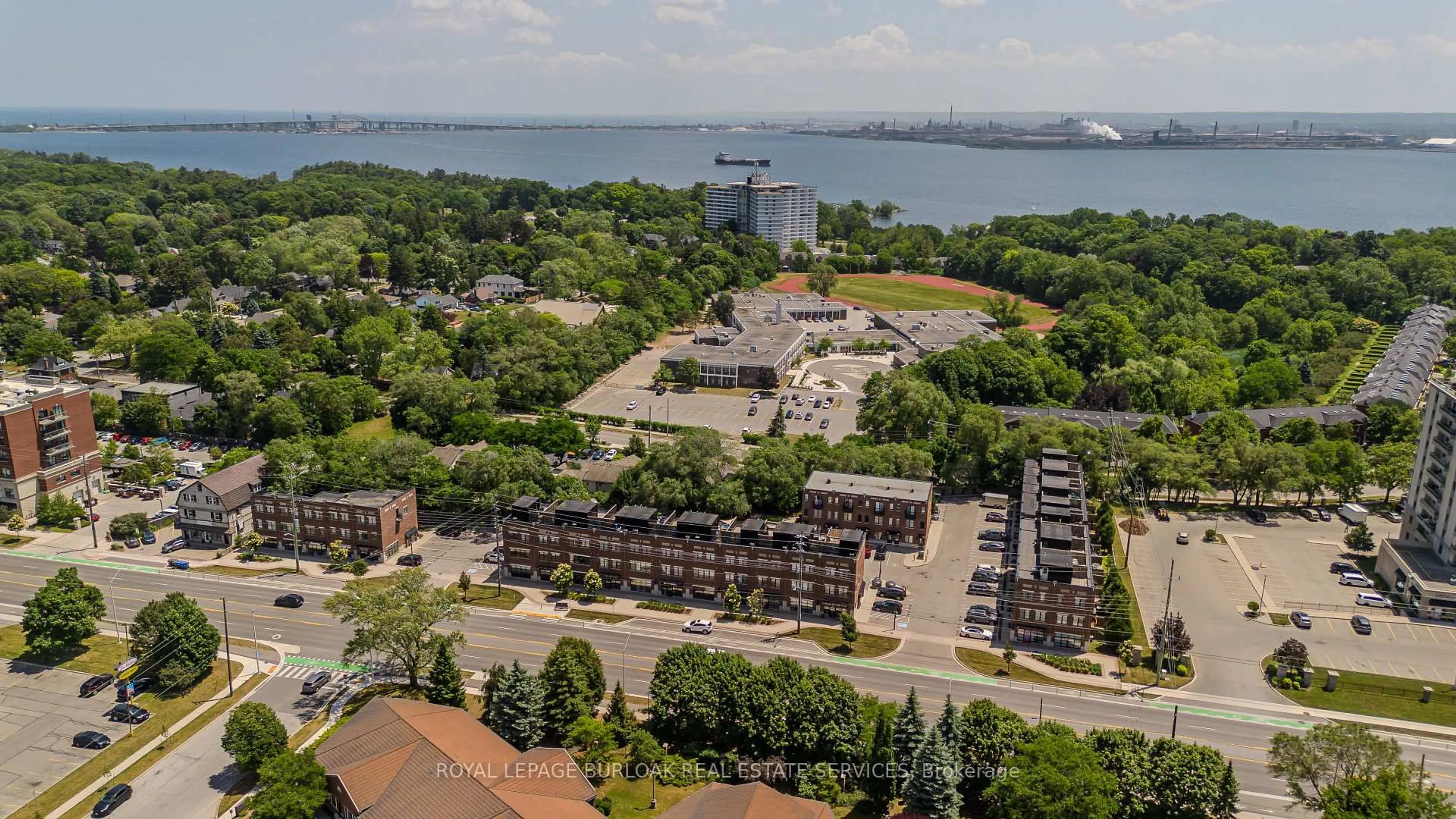 A pic from outside/outdoor area/front of a property/back of a property/a pic from drone, water/lake/river/ocean view for 70 Plains Rd #46, Burlington Ontario L7T 0B6