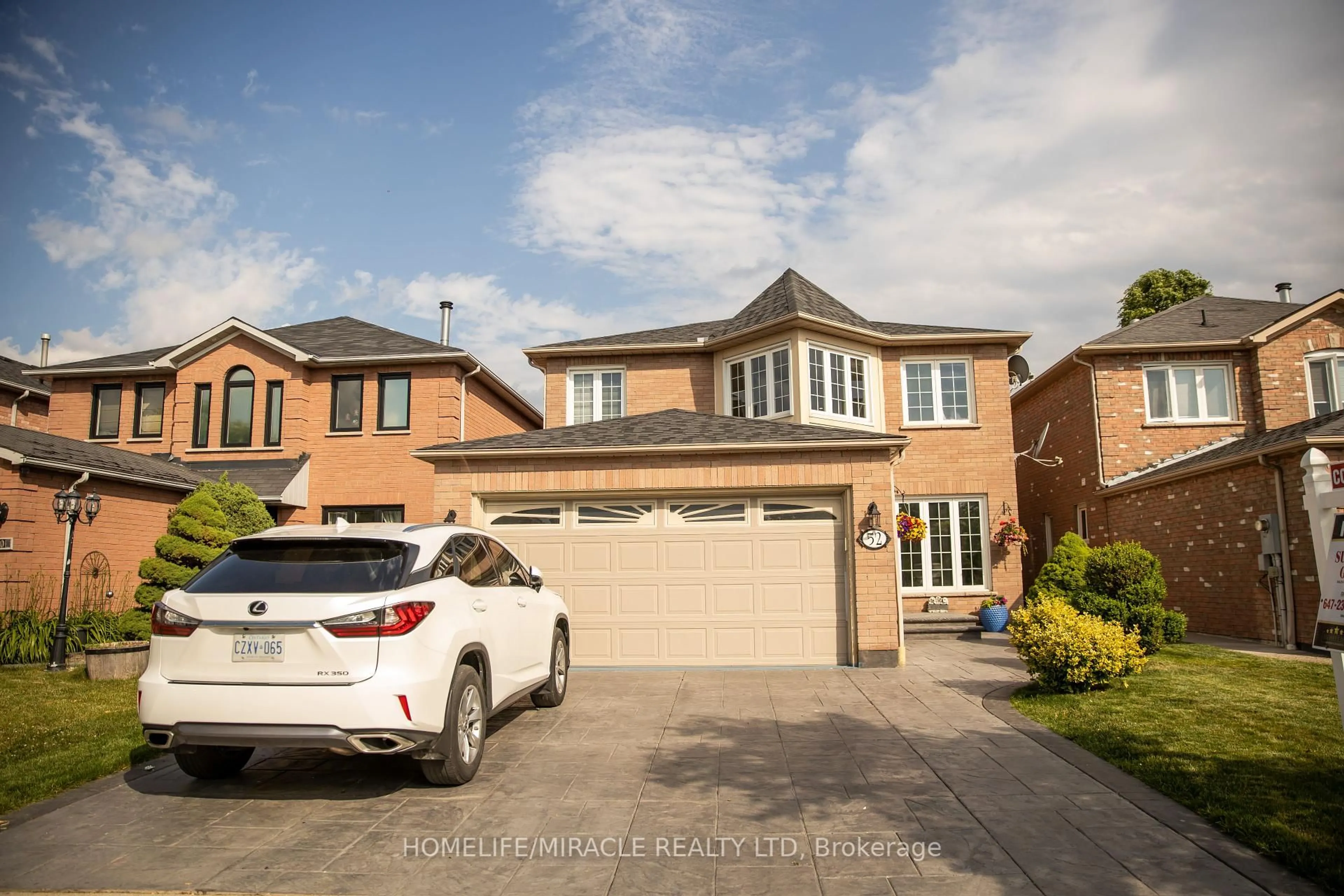 Home with brick exterior material, street for 52 Novella Pl, Brampton Ontario L6S 5X1