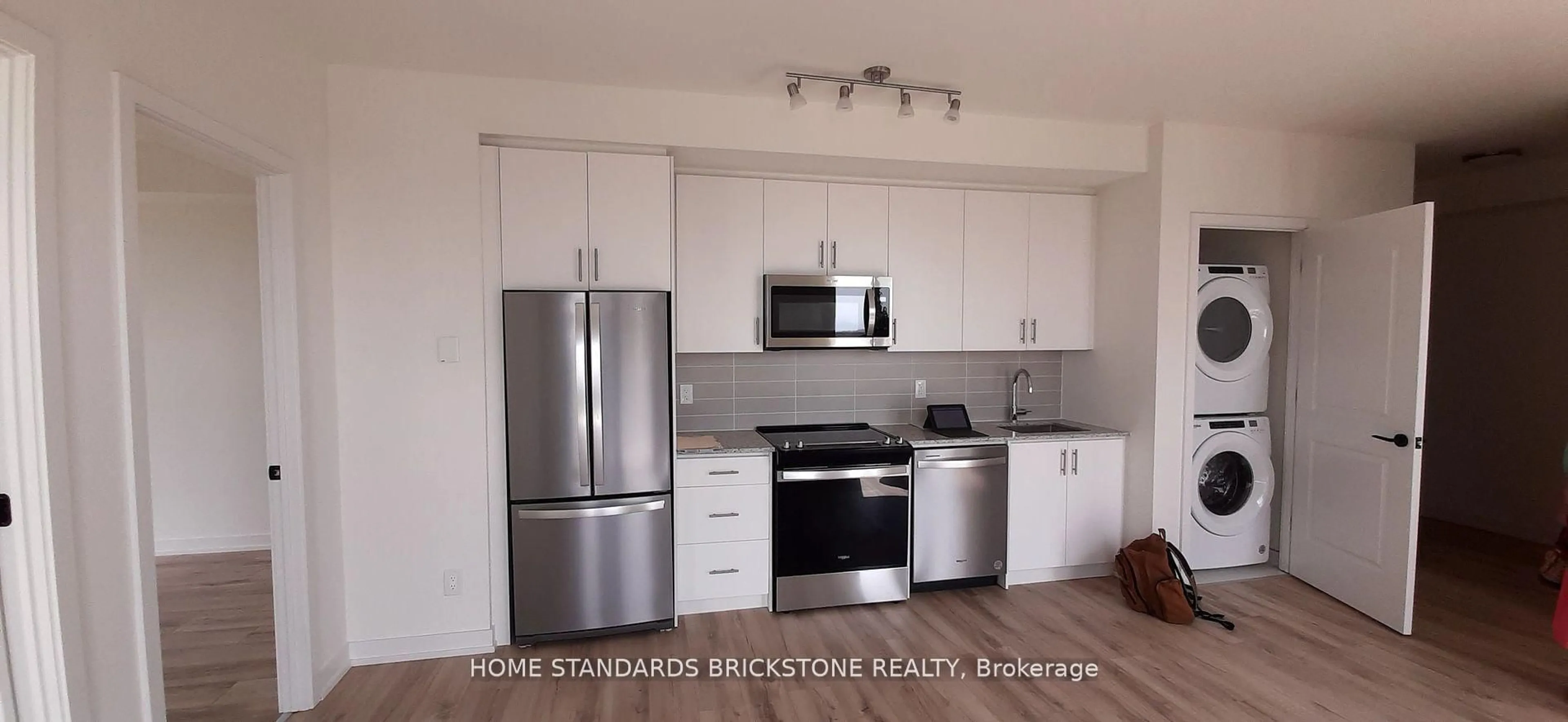 Standard kitchen, wood/laminate floor for 335 wheat boom Dr #1503, Oakville Ontario L6H 7Y1
