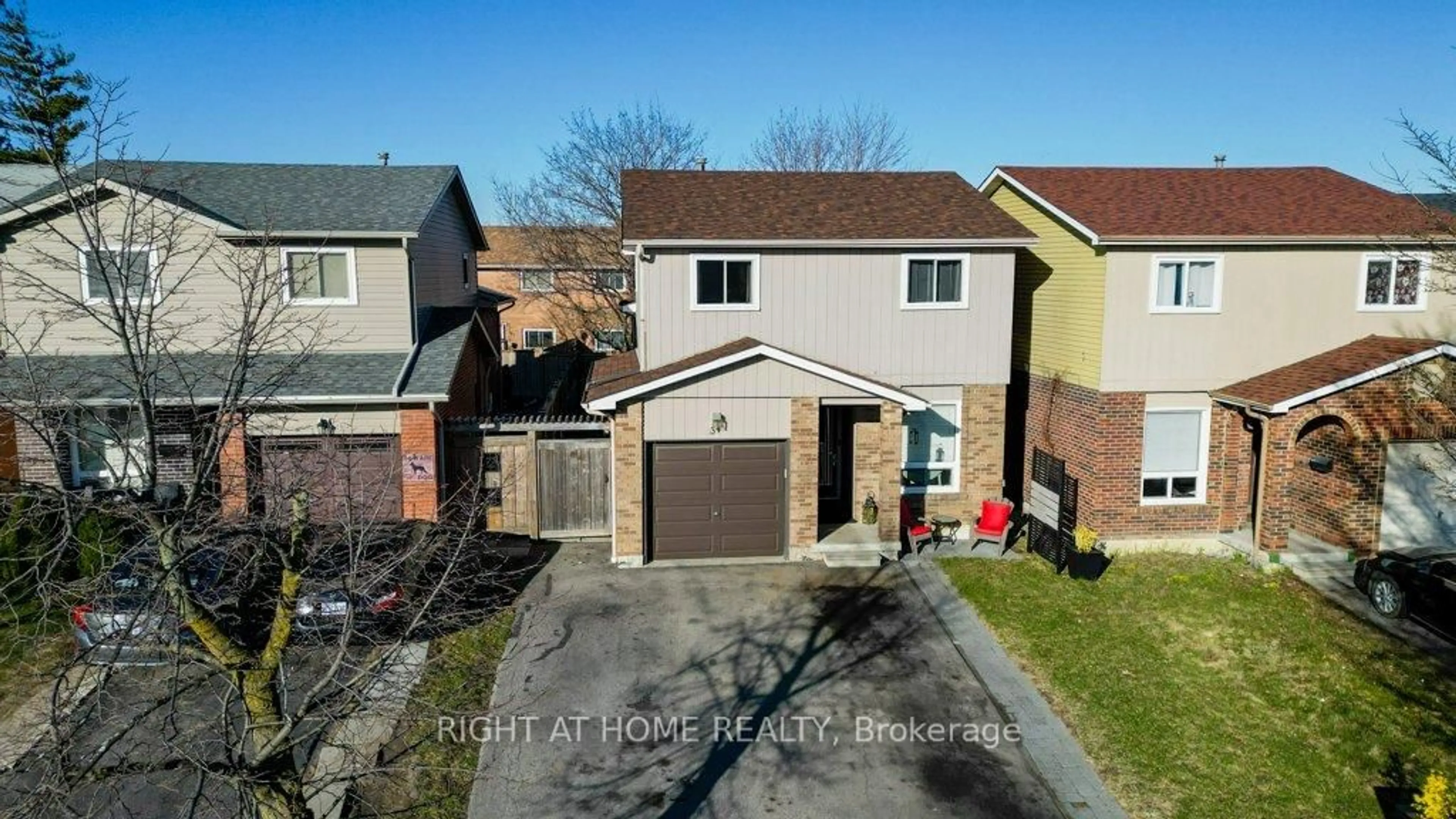 A pic from outside/outdoor area/front of a property/back of a property/a pic from drone, street for 34 Langston Dr, Brampton Ontario L6V 3W7