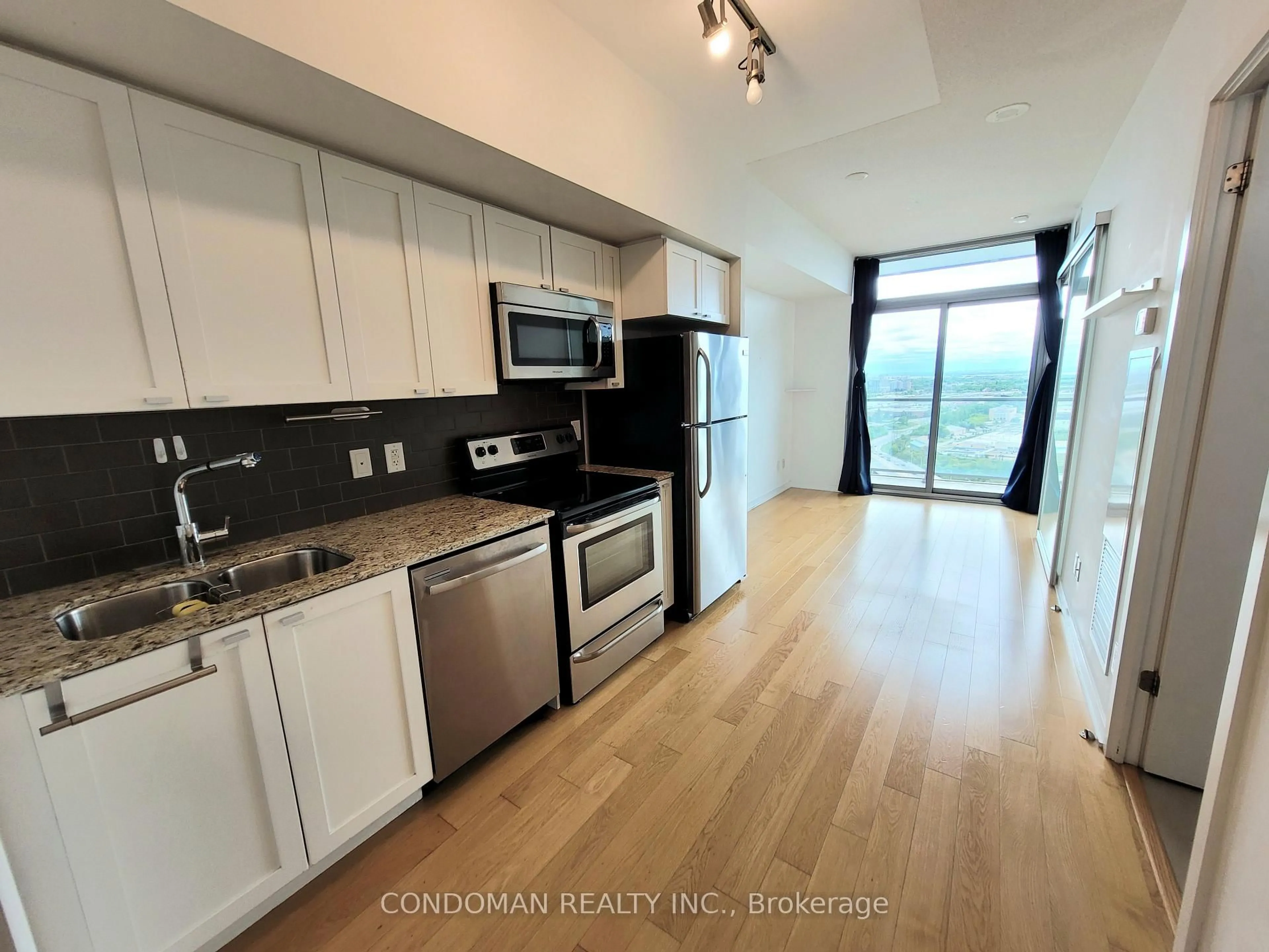 Open concept kitchen, unknown for 105 The Queensway Ave #2508, Toronto Ontario M6S 5B5