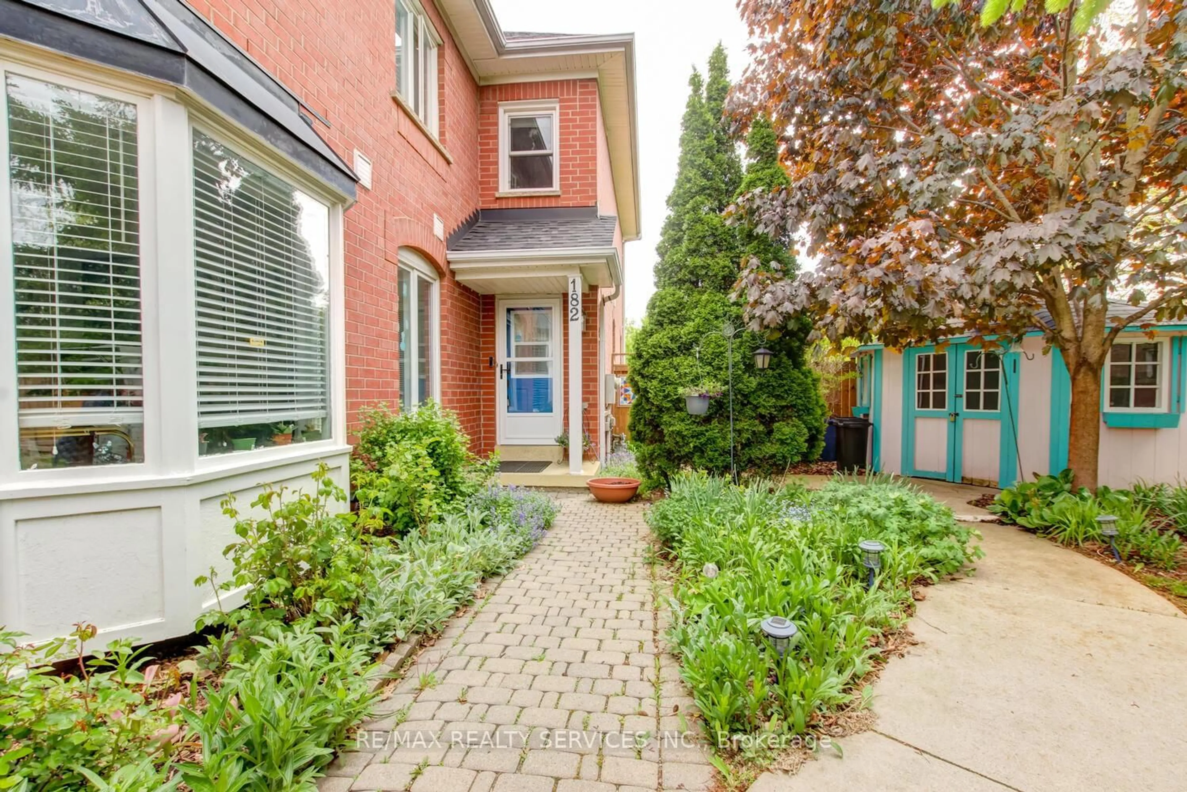 Home with brick exterior material, street for 182 Pressed Brick Dr, Brampton Ontario L6V 4K6