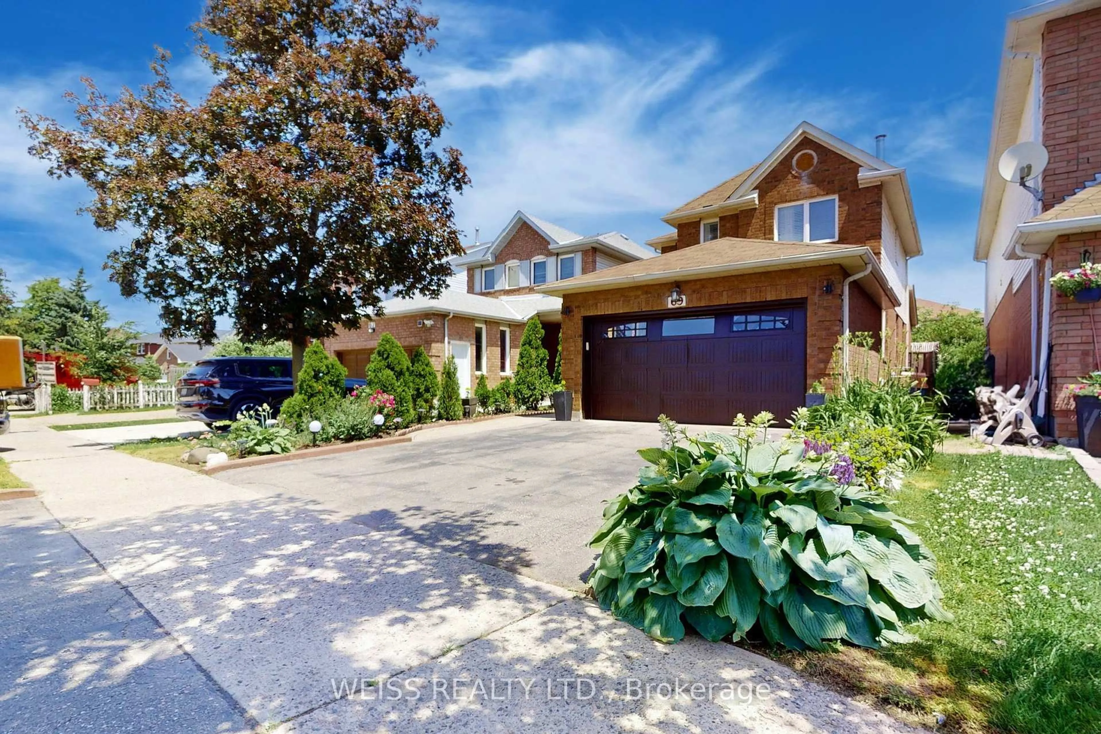 Home with brick exterior material, street for 69 Wooliston Cres, Brampton Ontario L6Y 4J4