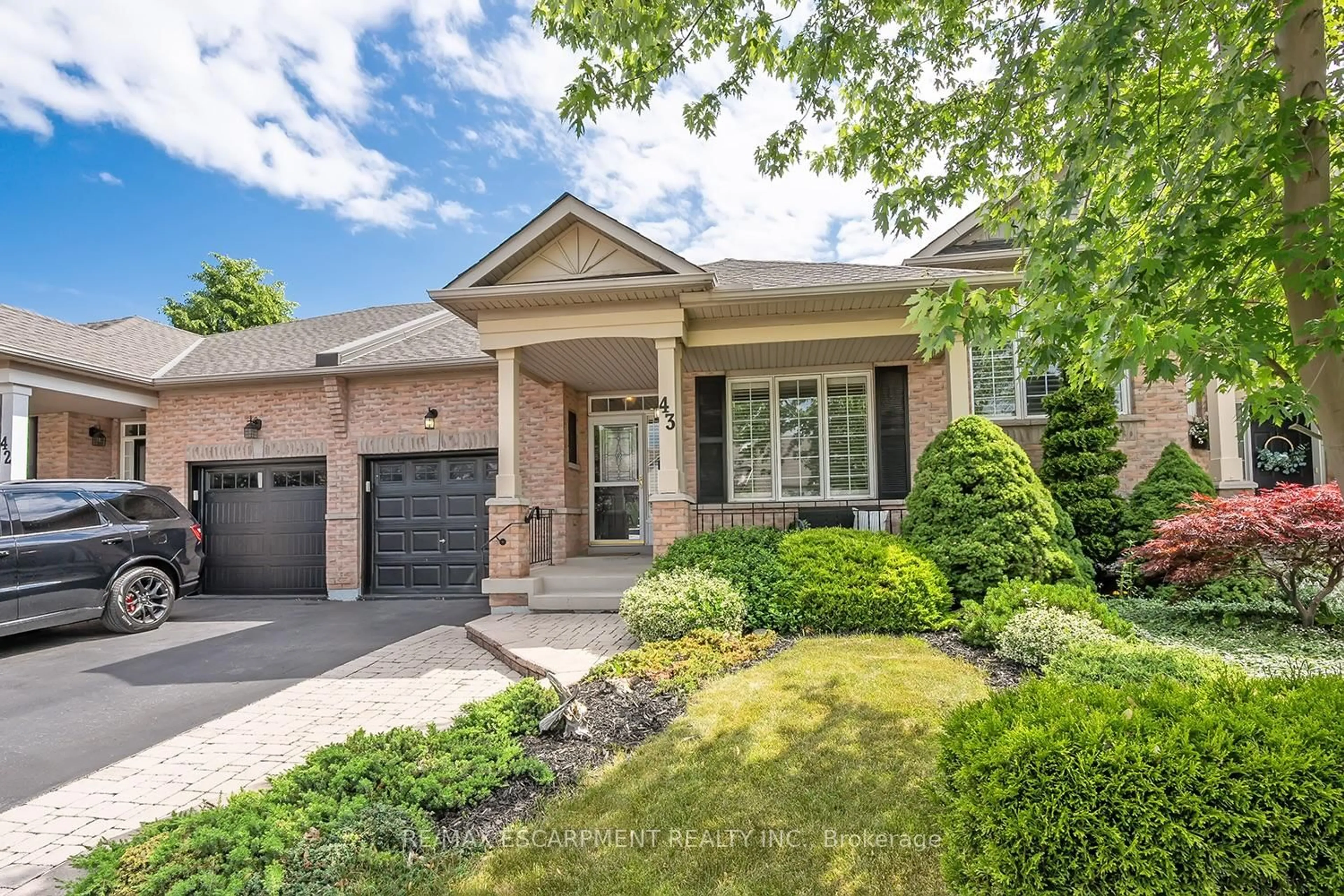 Home with brick exterior material, street for 2243 Turnberry Rd #43, Burlington Ontario L7M 4Y5