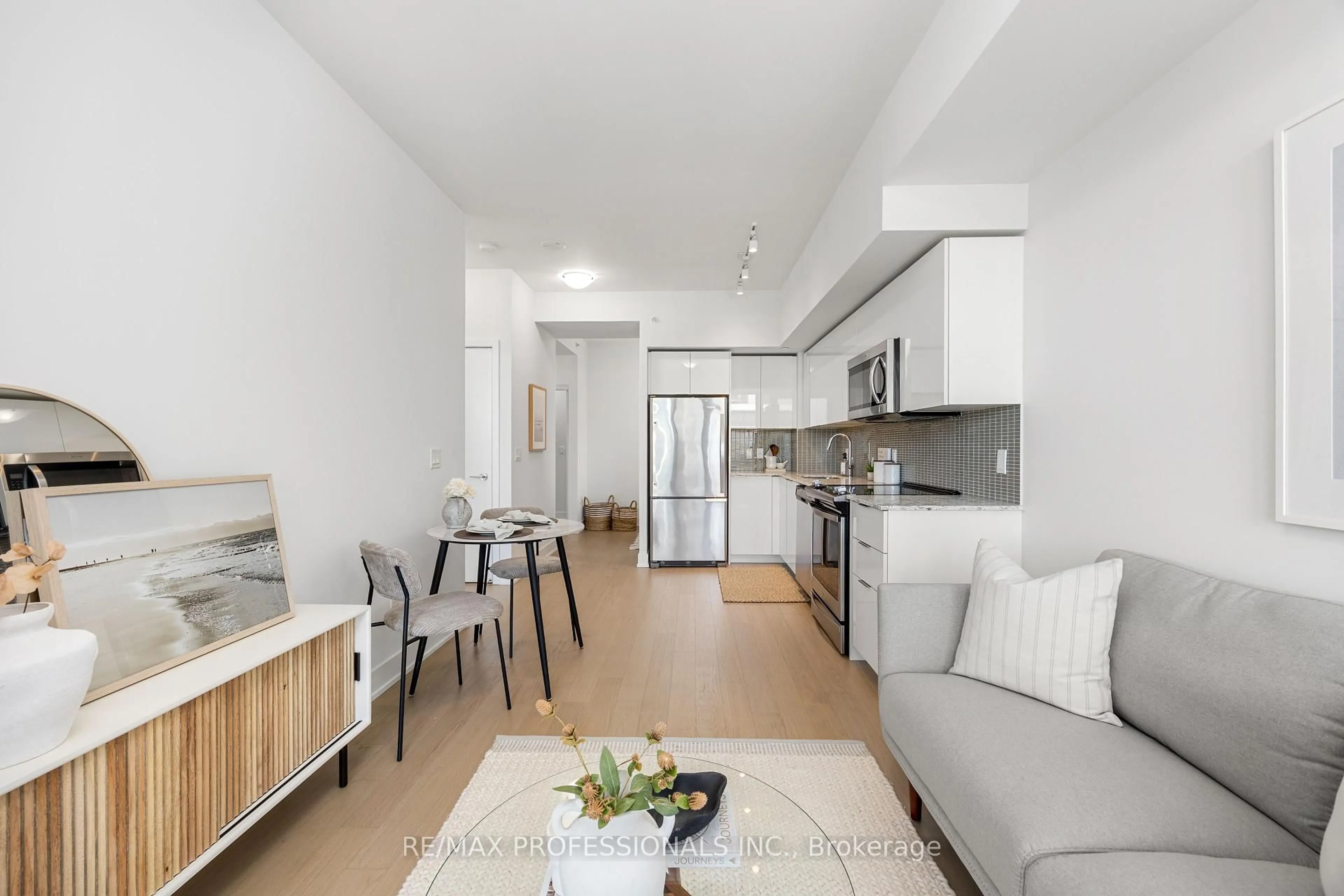 Living room with furniture, unknown for 20 Shore Breeze Dr #1406, Toronto Ontario M8V 0C7