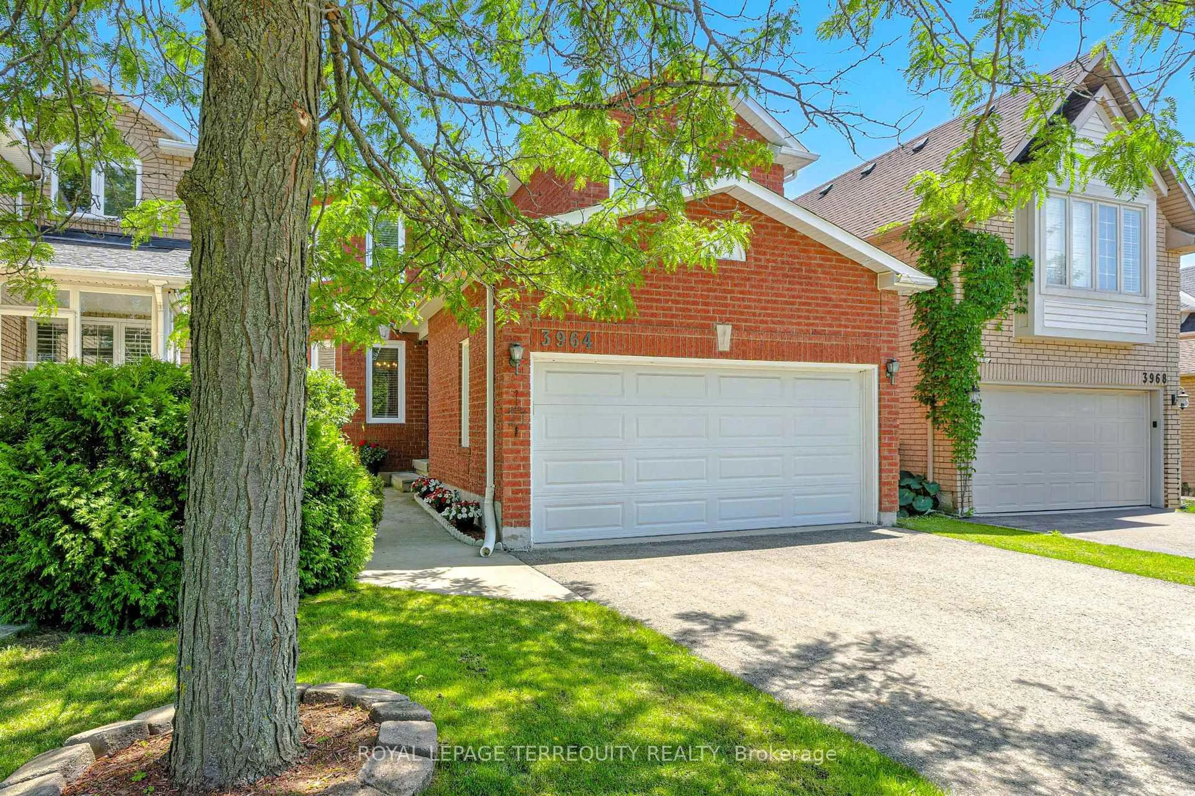 Home with brick exterior material, street for 3964 Honey Locust Tr, Mississauga Ontario L5N 7A5