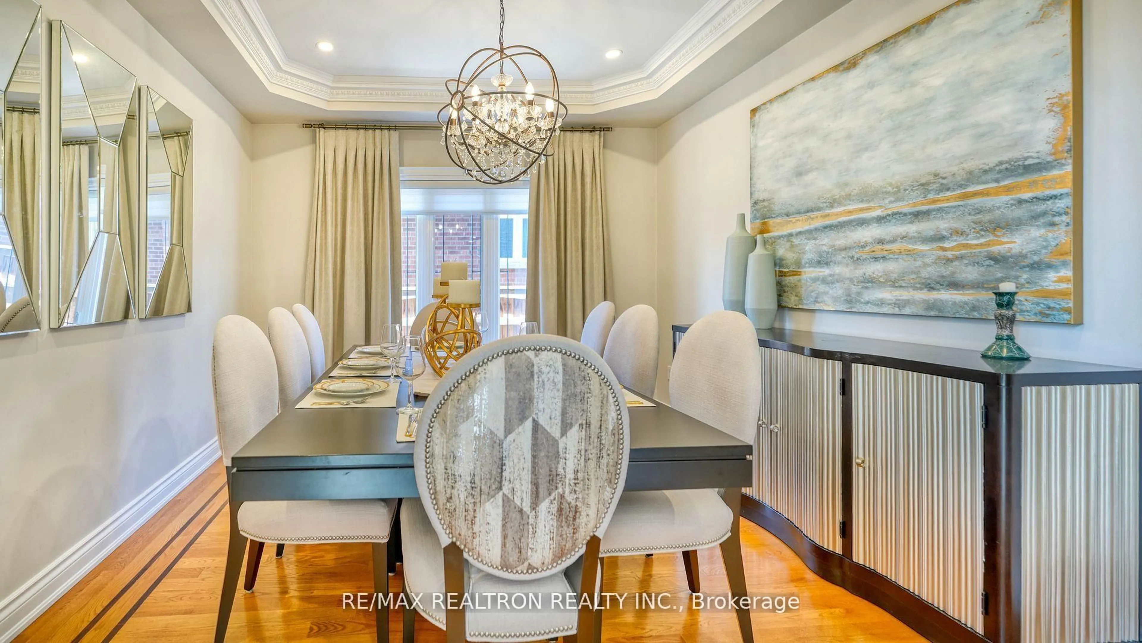 Dining room, wood/laminate floor for 13 Bourdon Ave, Toronto Ontario M6L 2Y7