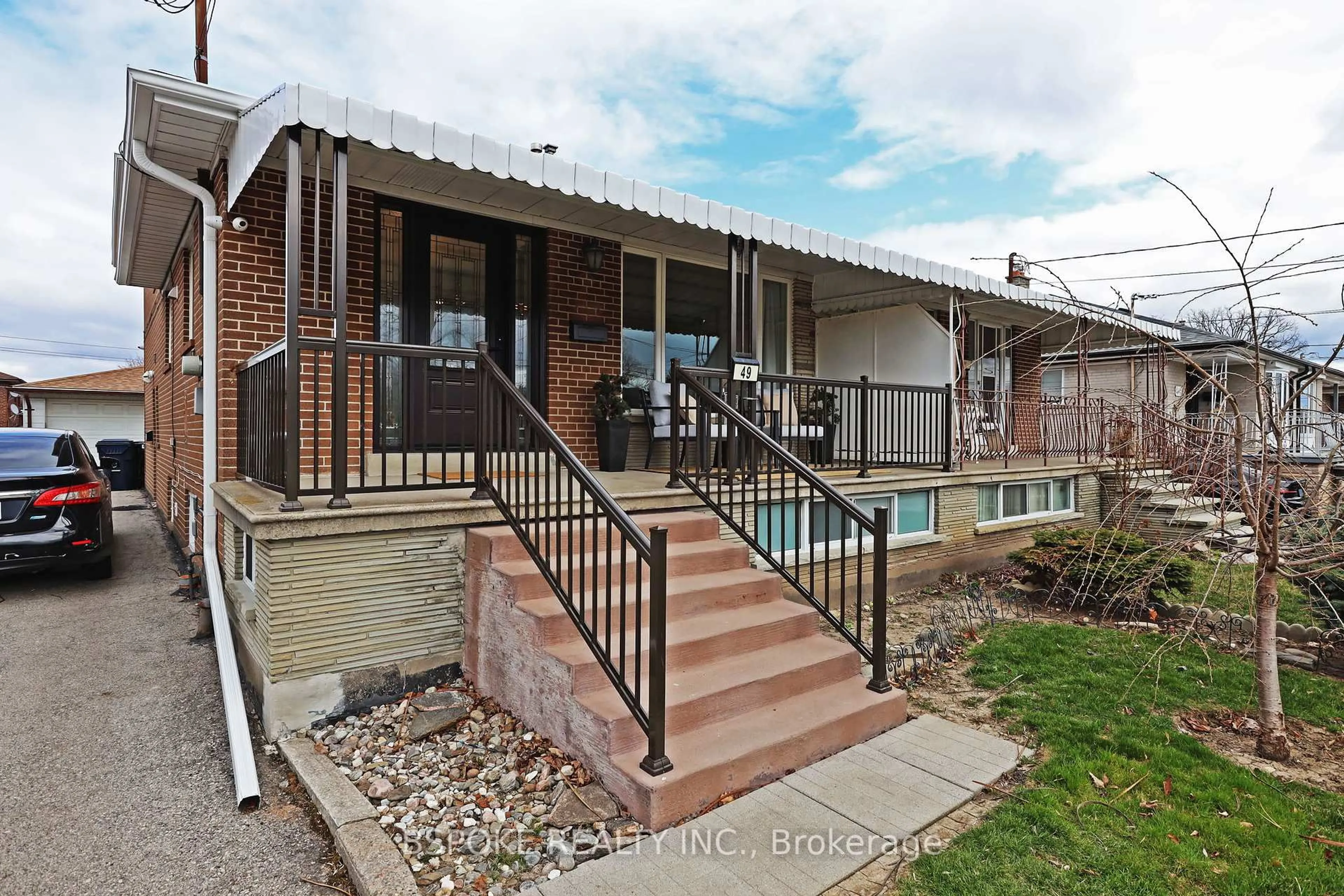Home with brick exterior material, street for 49 Howbert Dr, Toronto Ontario M9N 3L1