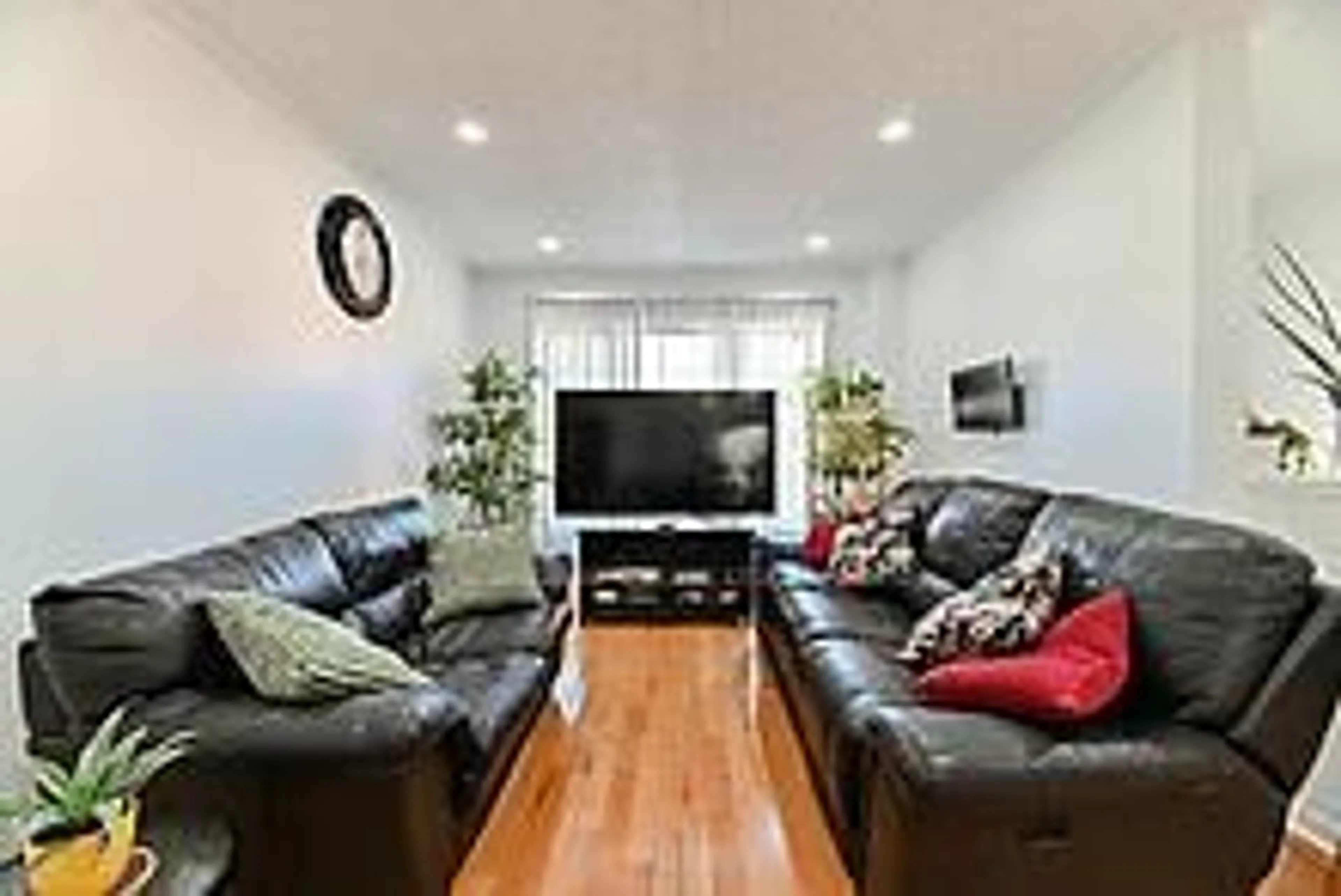 Living room with furniture, wood/laminate floor for 3020 Cedarglen Gate #35, Mississauga Ontario L5C 4S7