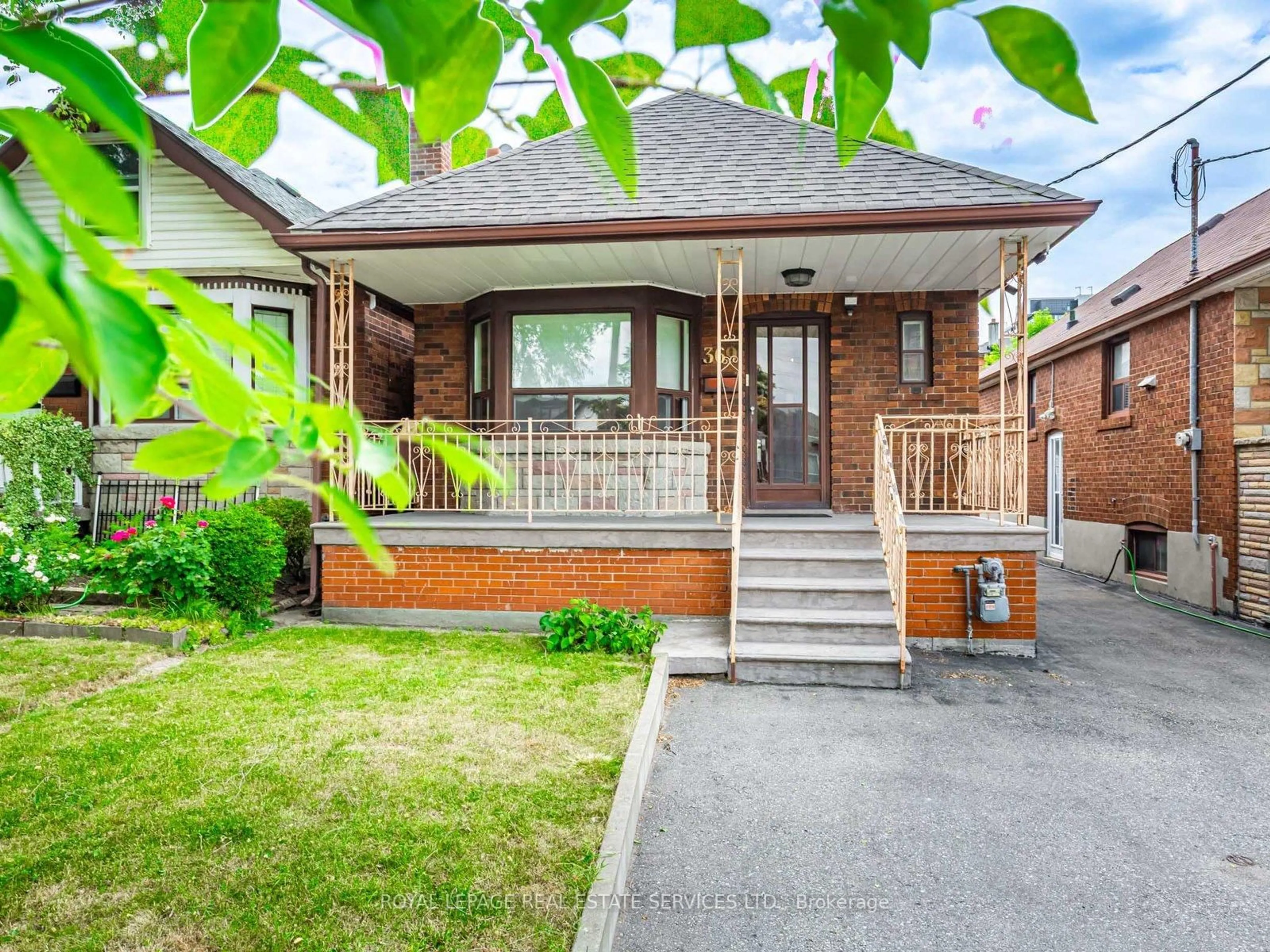 Home with brick exterior material, street for 369 Whitmore Ave, Toronto Ontario M6E 2N5