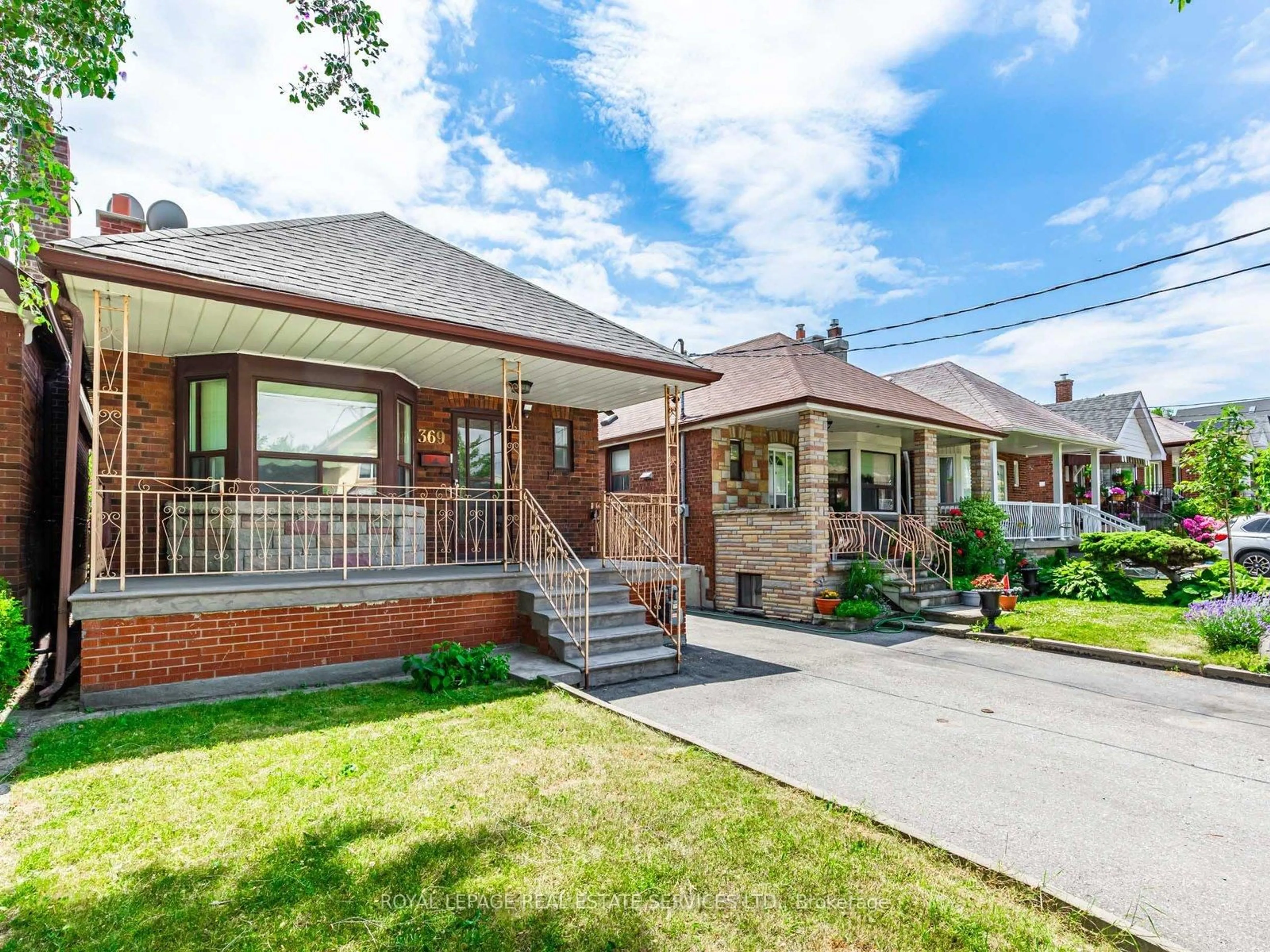 Home with brick exterior material, street for 369 Whitmore Ave, Toronto Ontario M6E 2N5