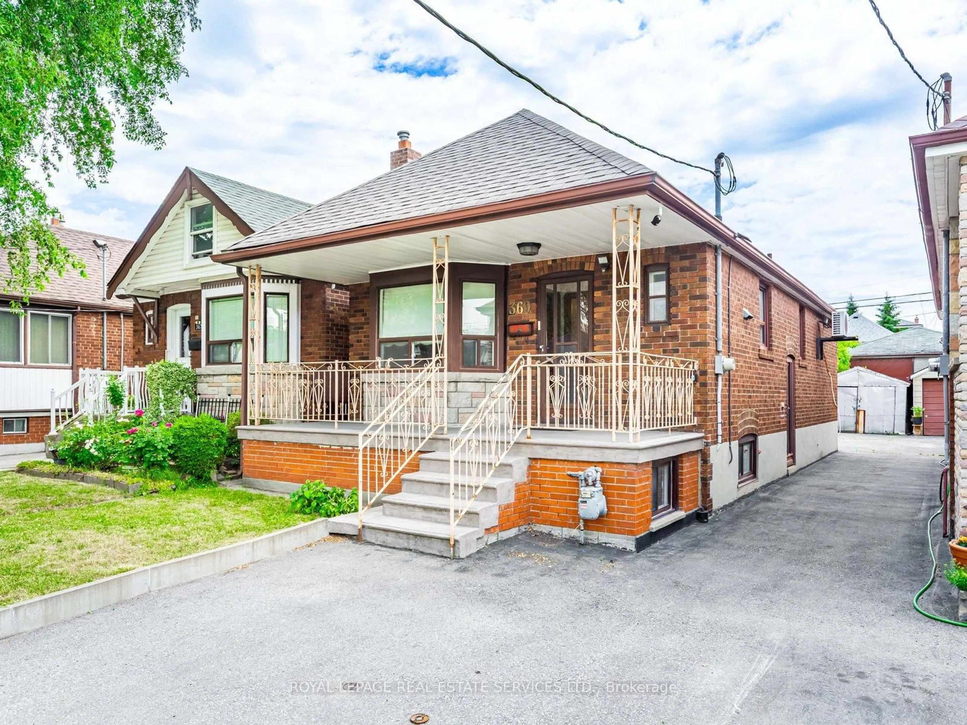 Home with brick exterior material, street for 369 Whitmore Ave, Toronto Ontario M6E 2N5
