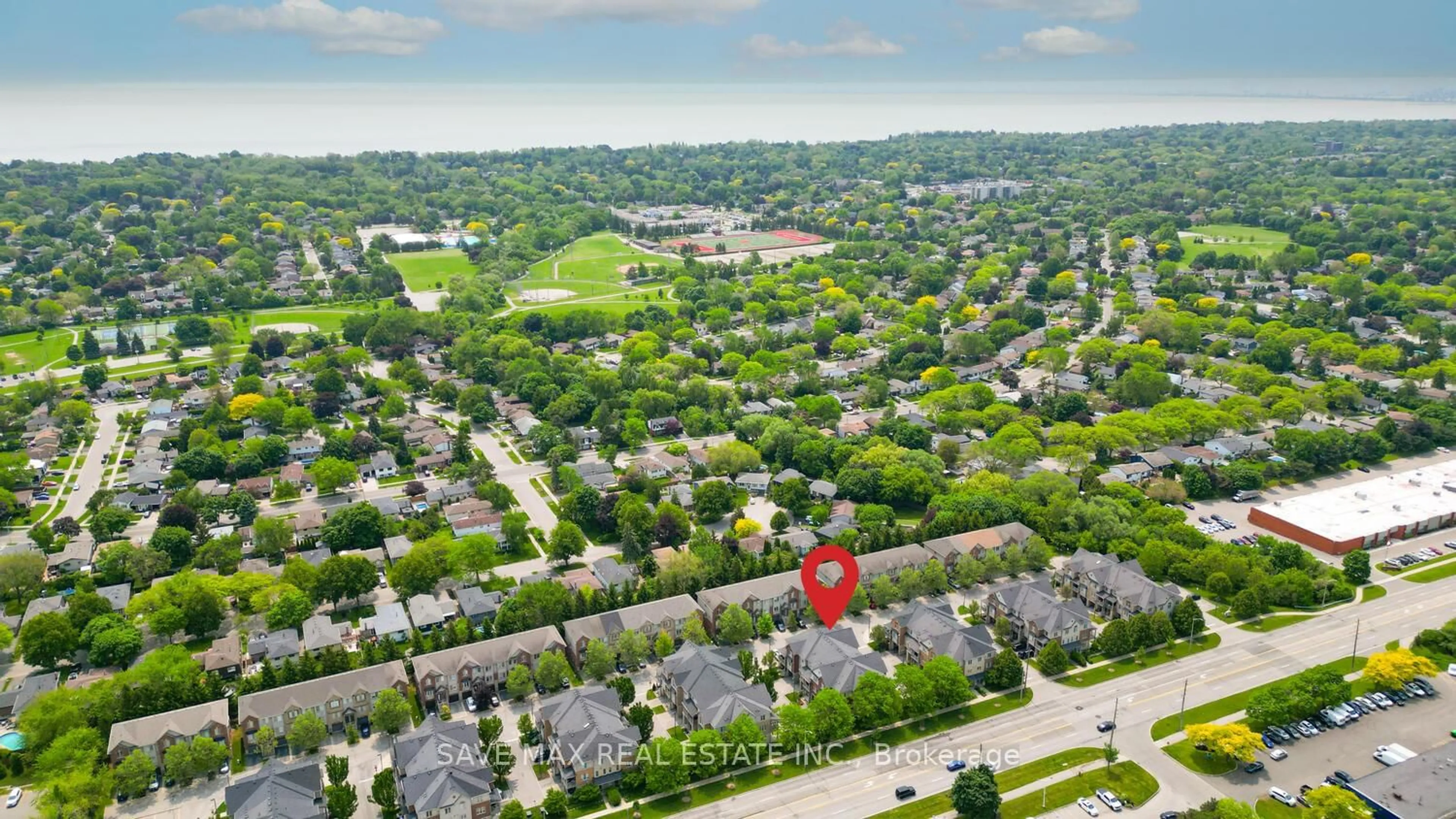 A pic from outside/outdoor area/front of a property/back of a property/a pic from drone, street for 623 Maude Common, Burlington Ontario L7L 0C7