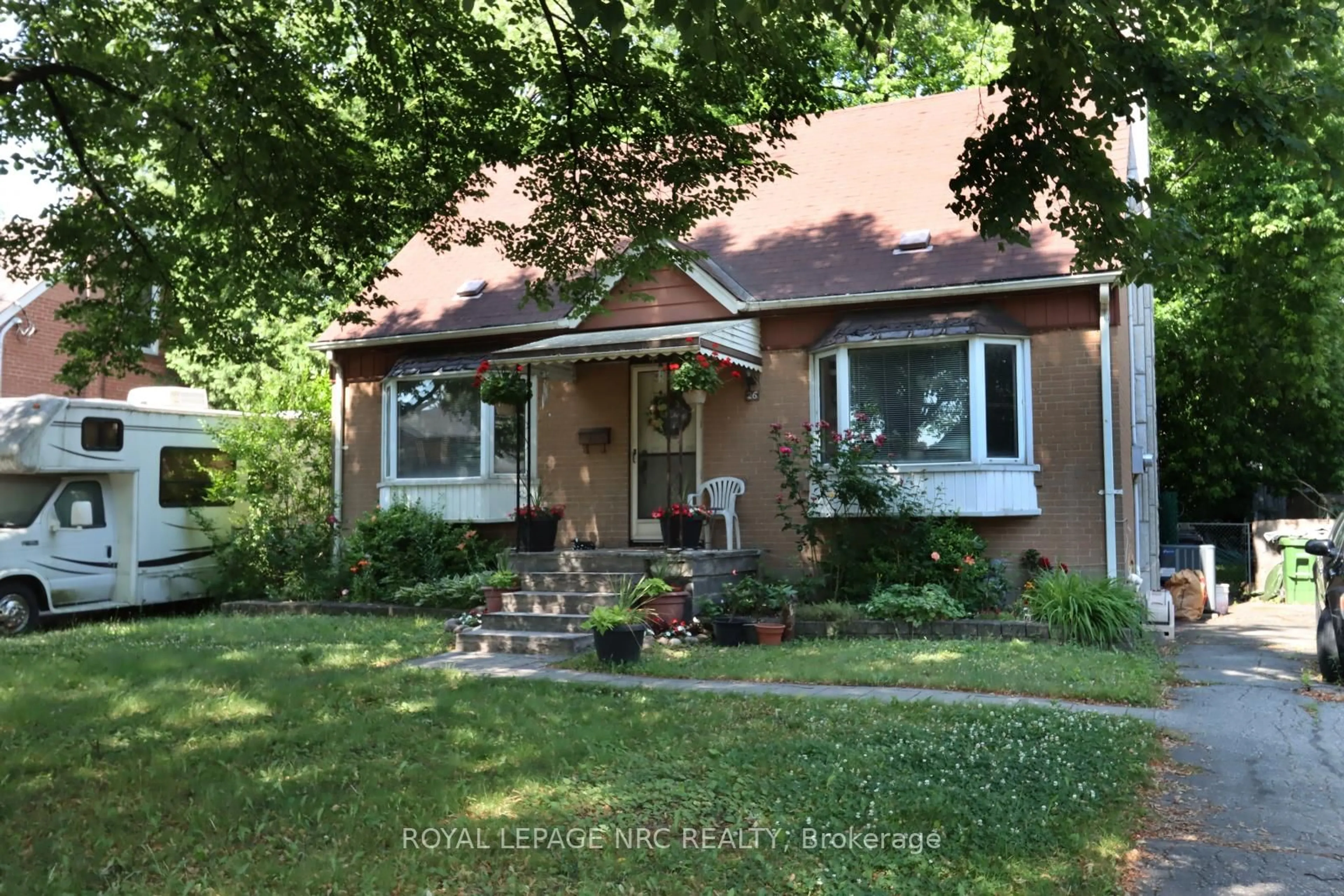Home with brick exterior material, street for 26 Ann Arbour Rd, Toronto Ontario M9M 2J6
