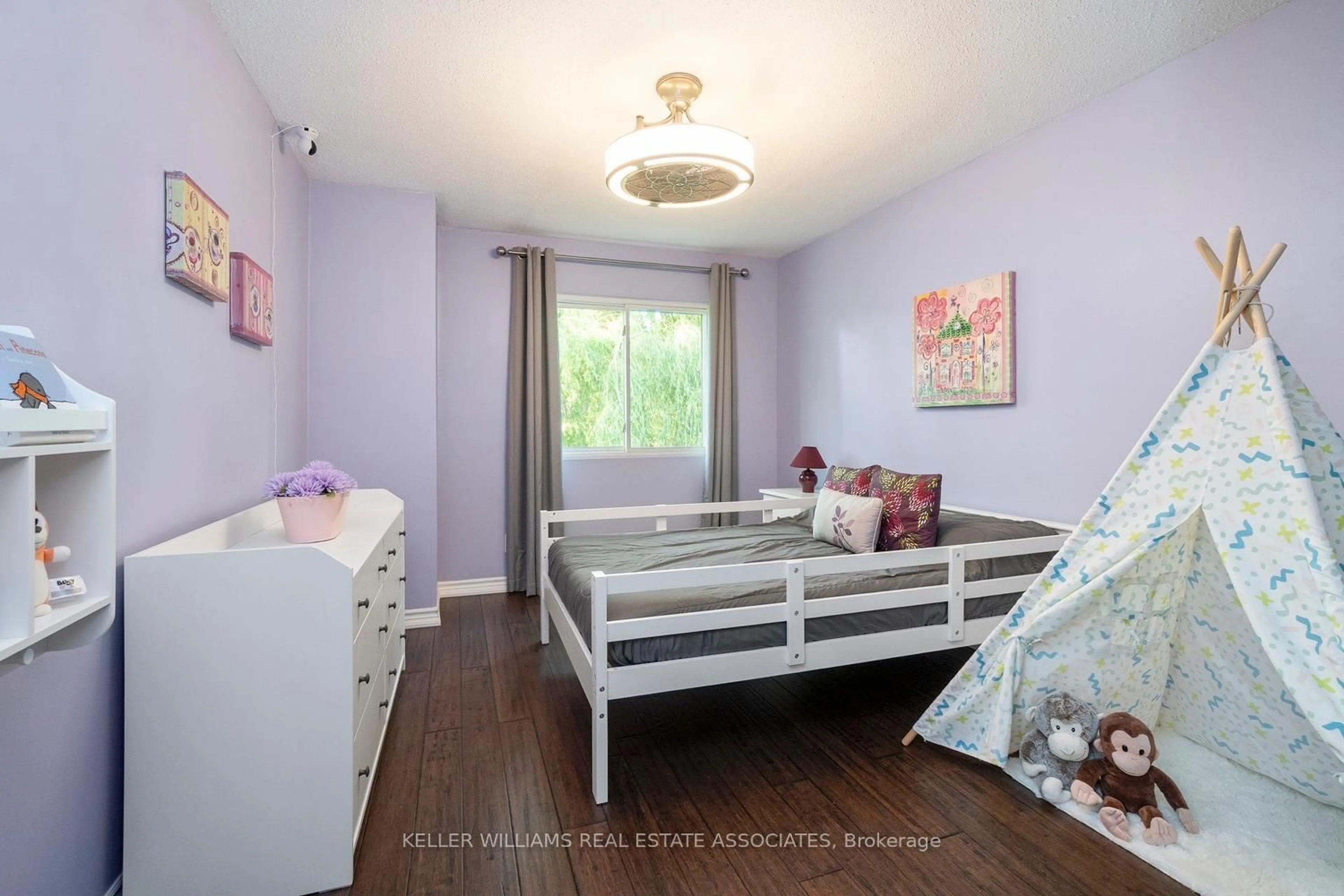 Bedroom with bed, wood/laminate floor for 3585 Ash Row Cres, Mississauga Ontario L5L 1K3