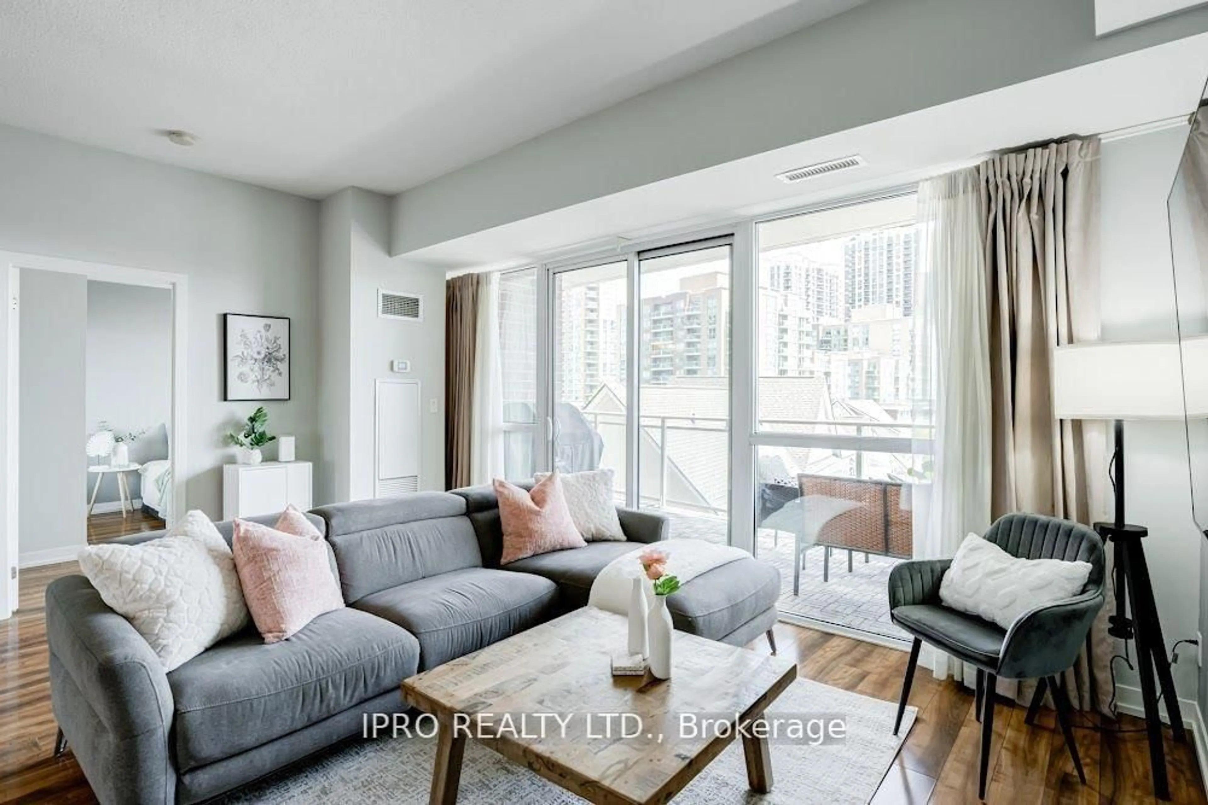 Living room with furniture, unknown for 5101 Dundas St #406, Toronto Ontario M9A 5G8