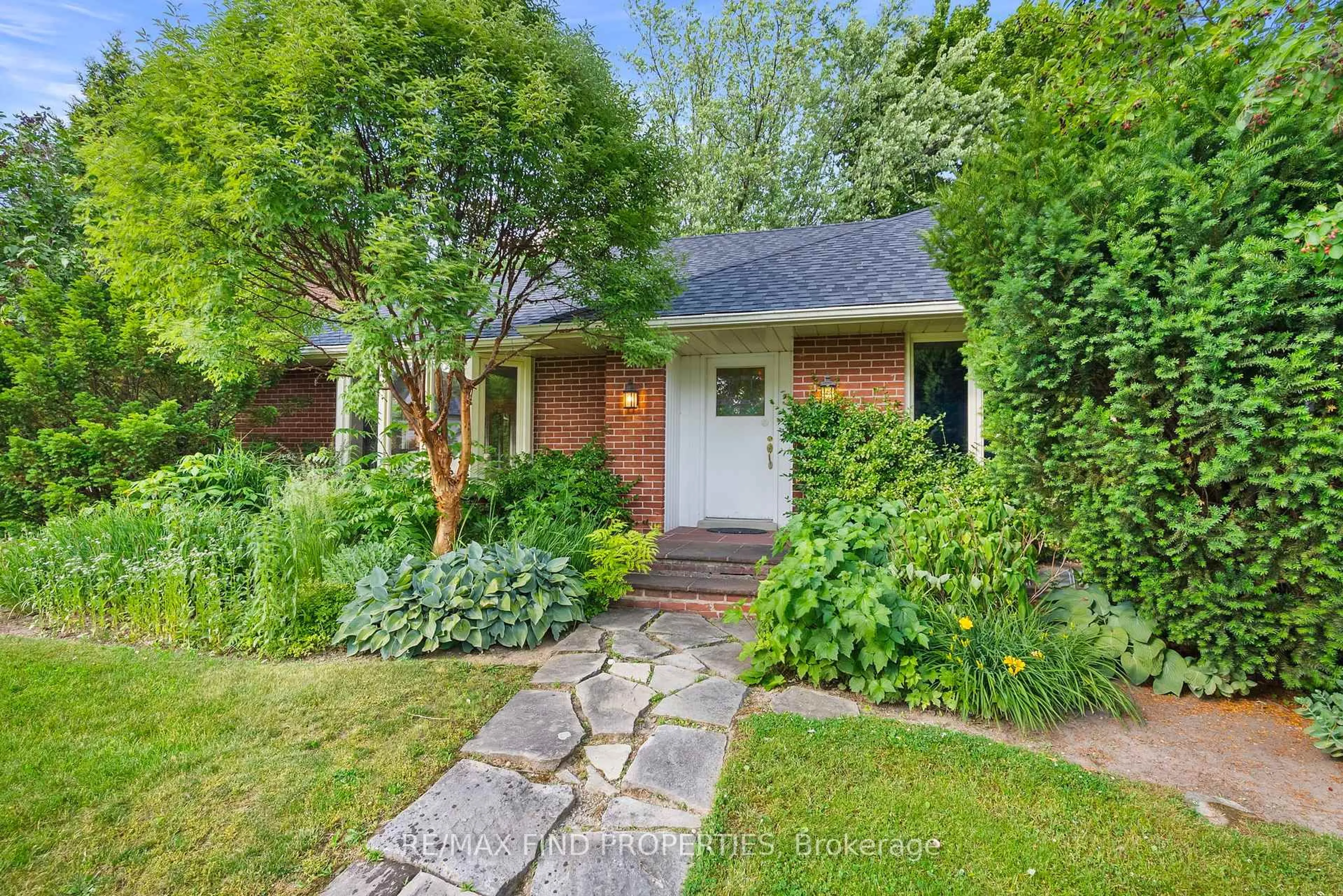 Home with brick exterior material, street for 56 Edenvale Cres, Toronto Ontario M9A 4A6