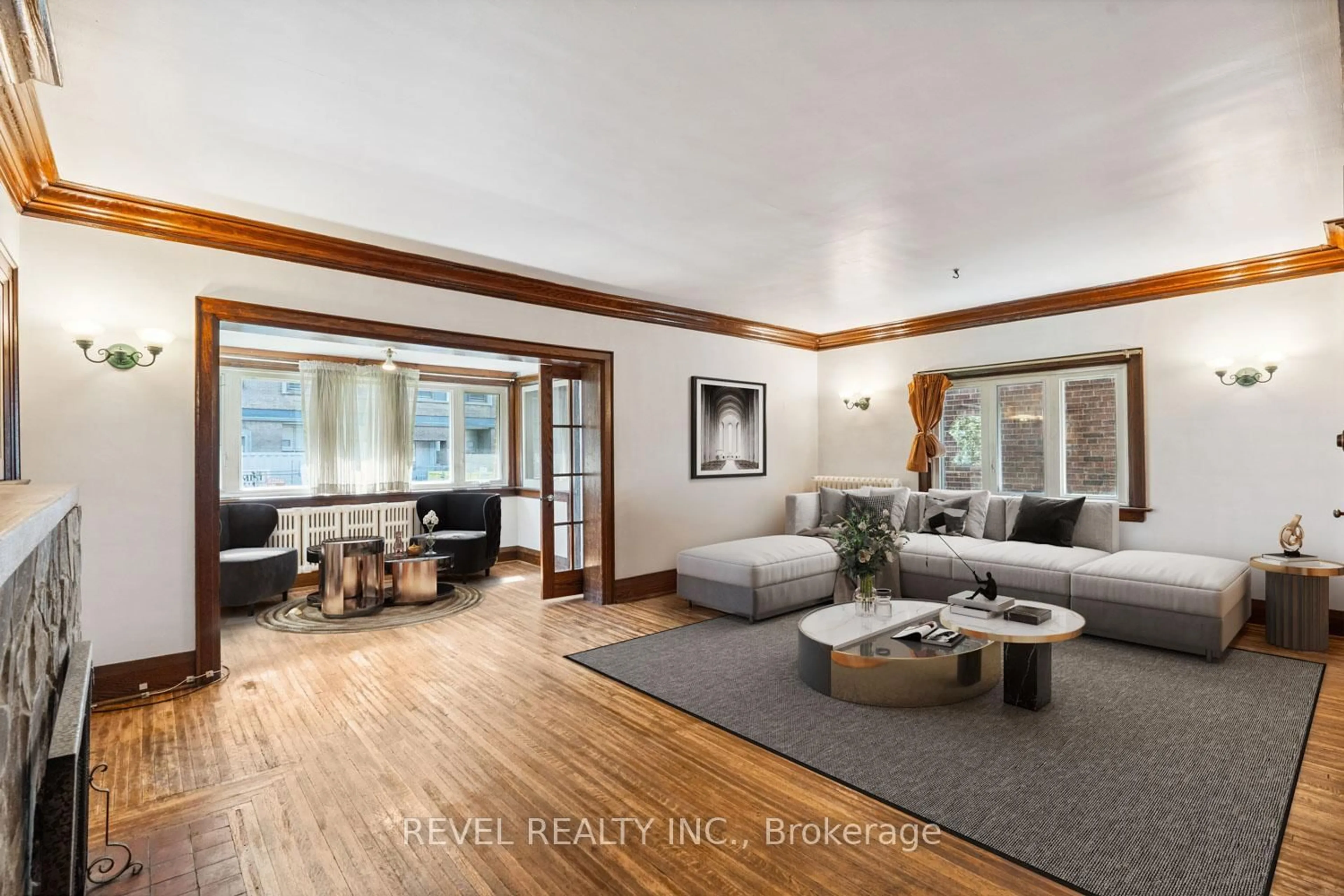 Living room with furniture, wood/laminate floor for 18 Glendale Ave Ave, Toronto Ontario M6R 2S7