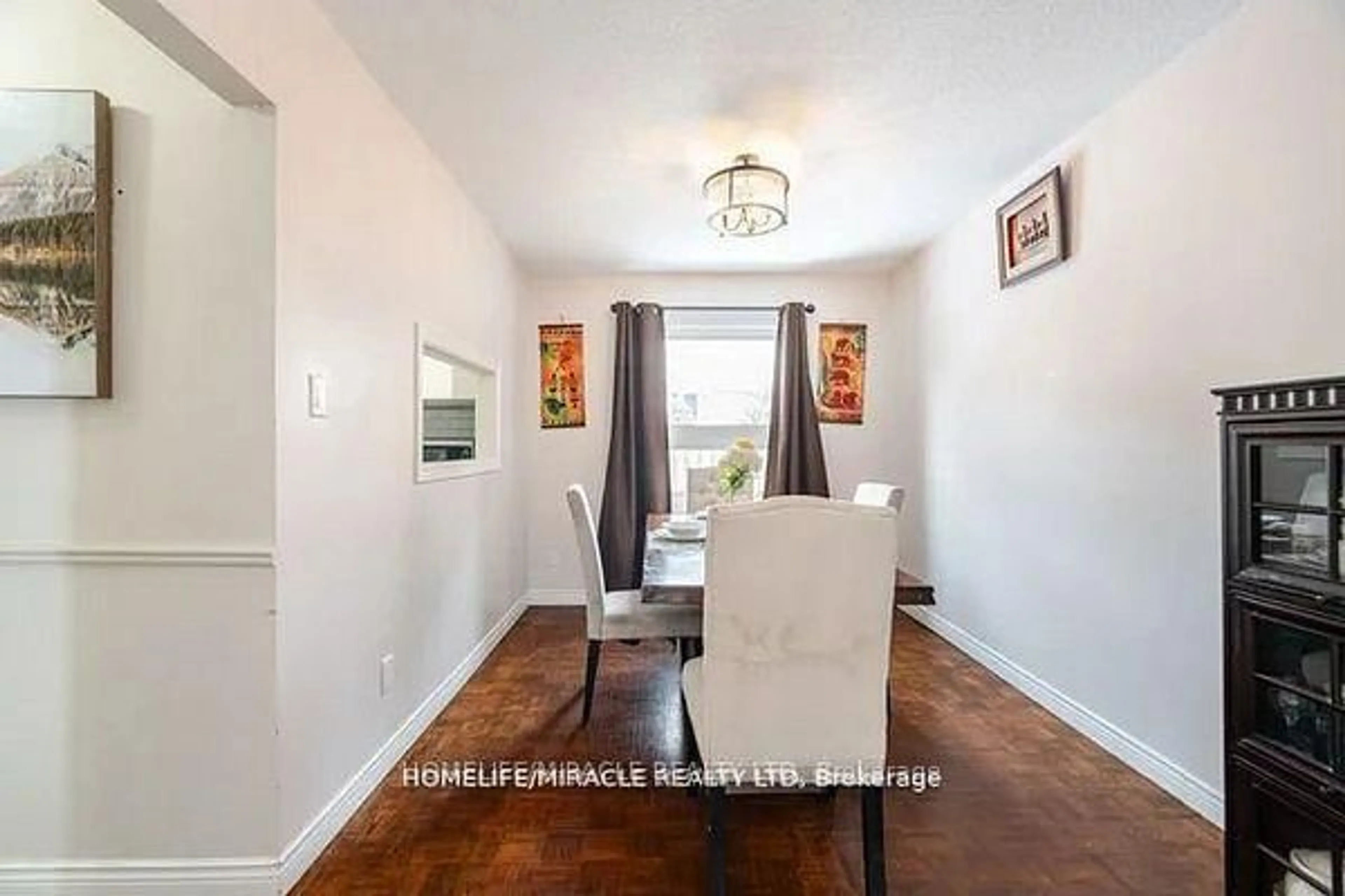 Dining room, wood/laminate floor for 7080 Copenhagen Rd #73, Mississauga Ontario L5N 2C9