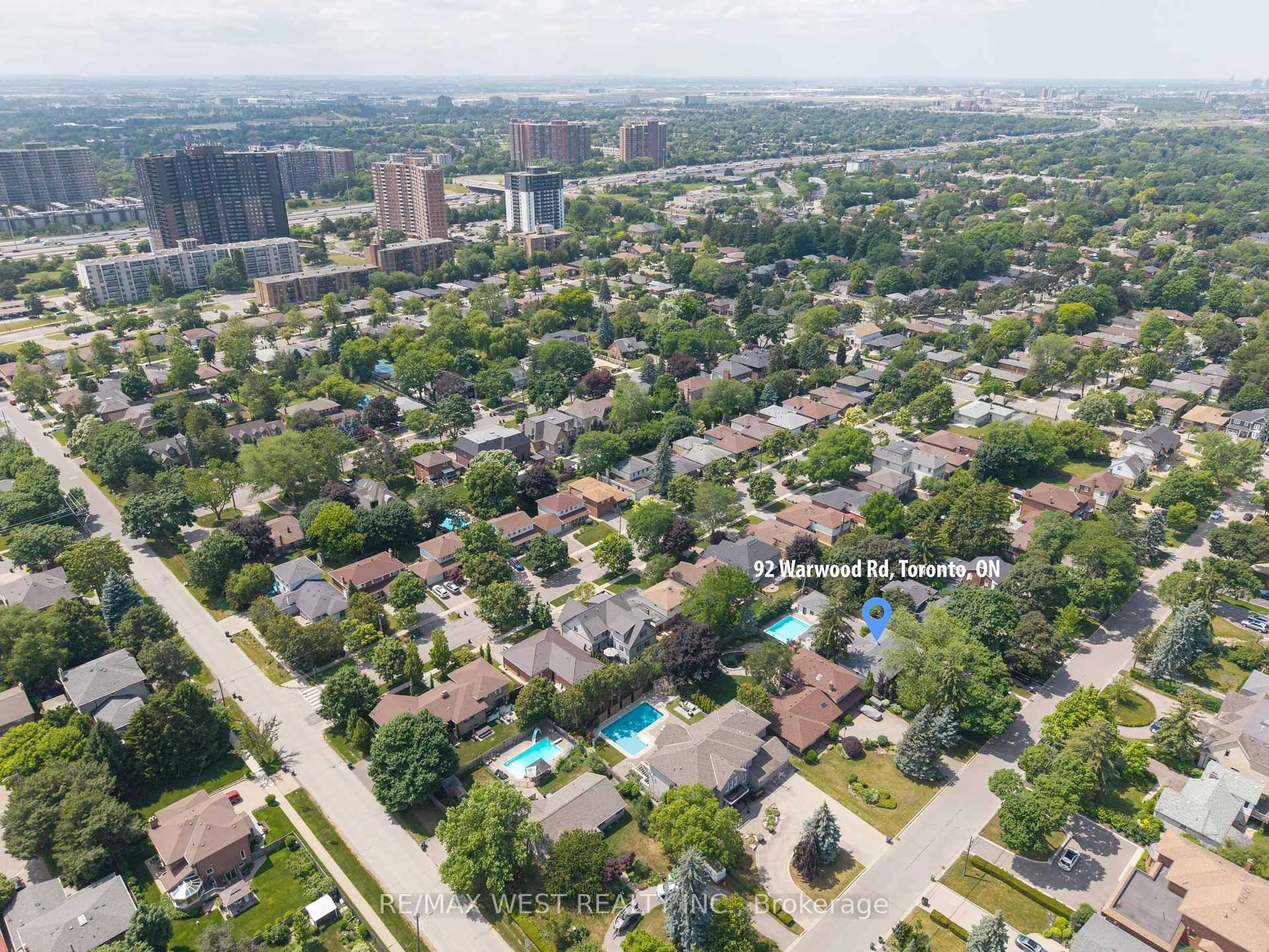 A pic from outside/outdoor area/front of a property/back of a property/a pic from drone, city buildings view from balcony for 92 Warwood Rd, Toronto Ontario M9B 5B7