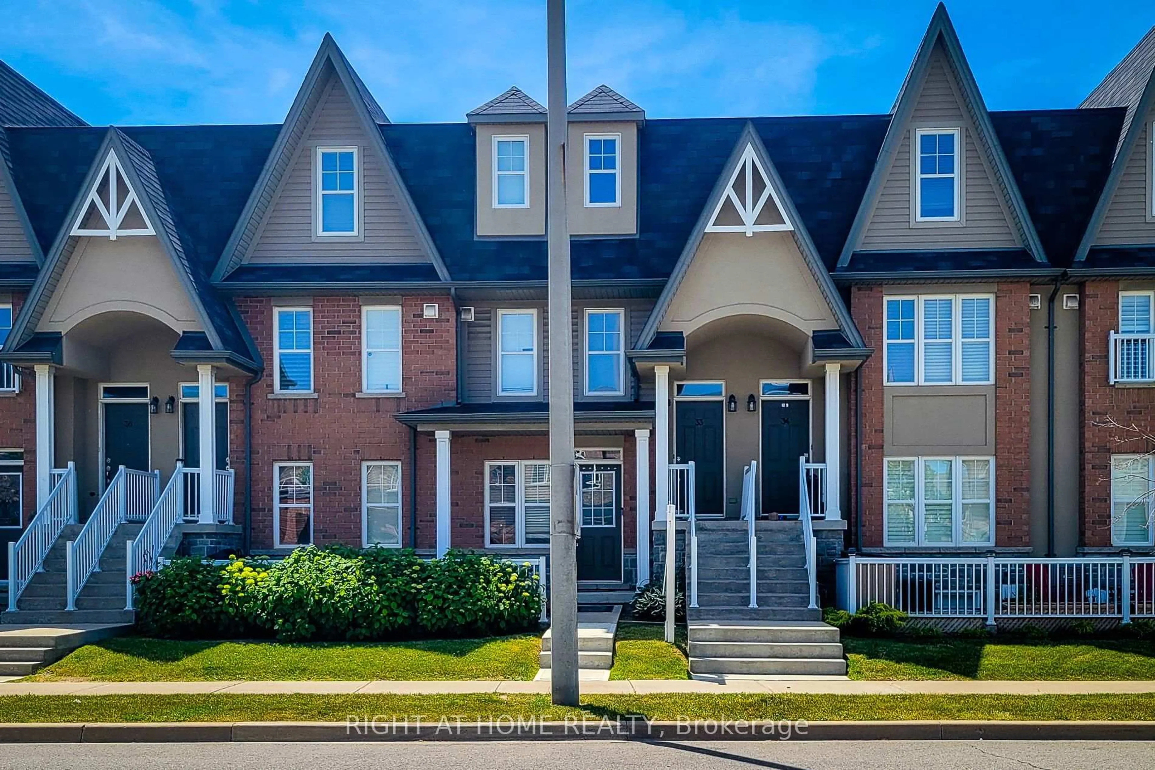Home with brick exterior material, street for 1380 Costigan Rd #33, Milton Ontario L9T 8L2