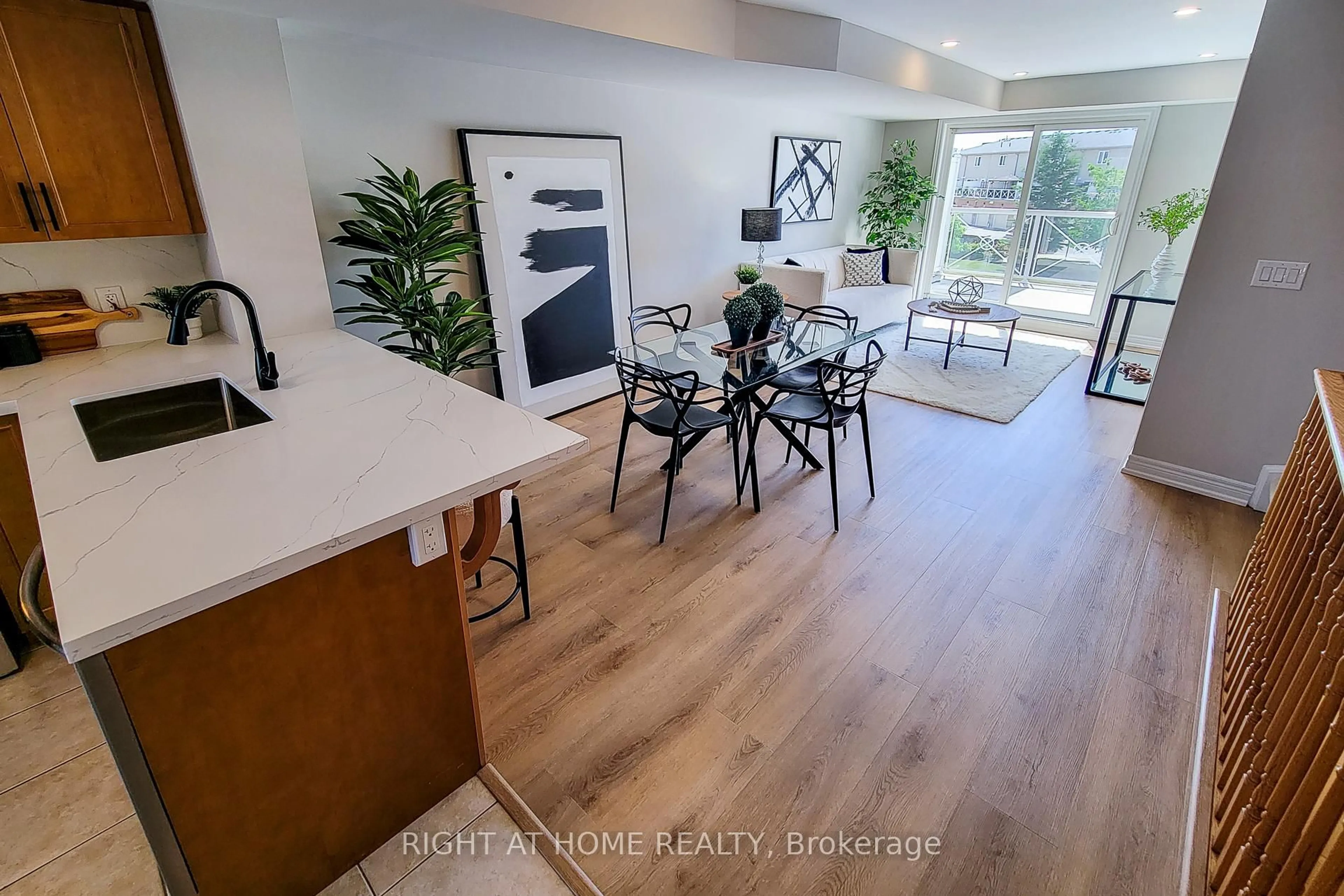 Open concept kitchen, wood/laminate floor for 1380 Costigan Rd #33, Milton Ontario L9T 8L2