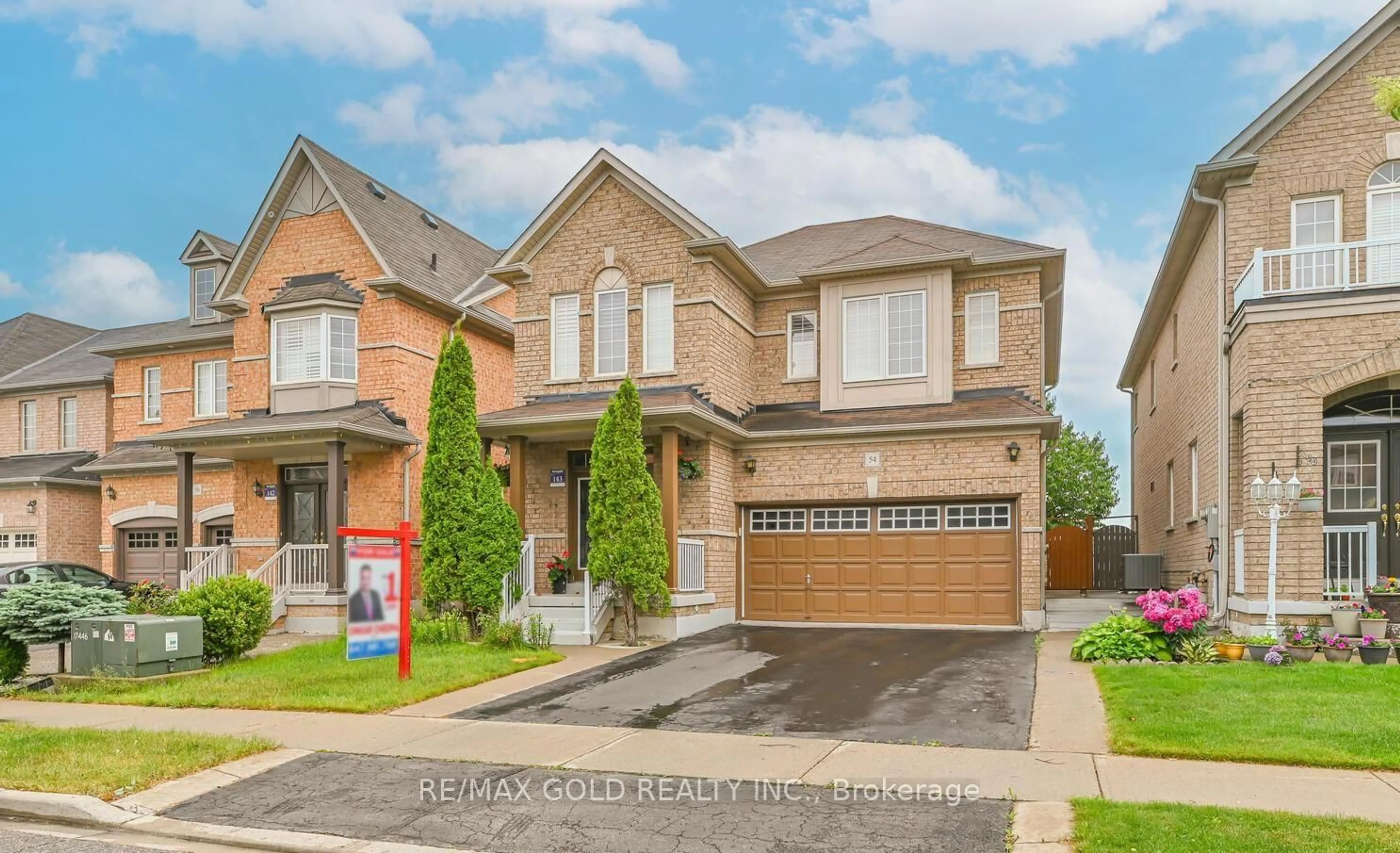 Home with brick exterior material, street for 54 Gamson Cres, Brampton Ontario L6R 0V6