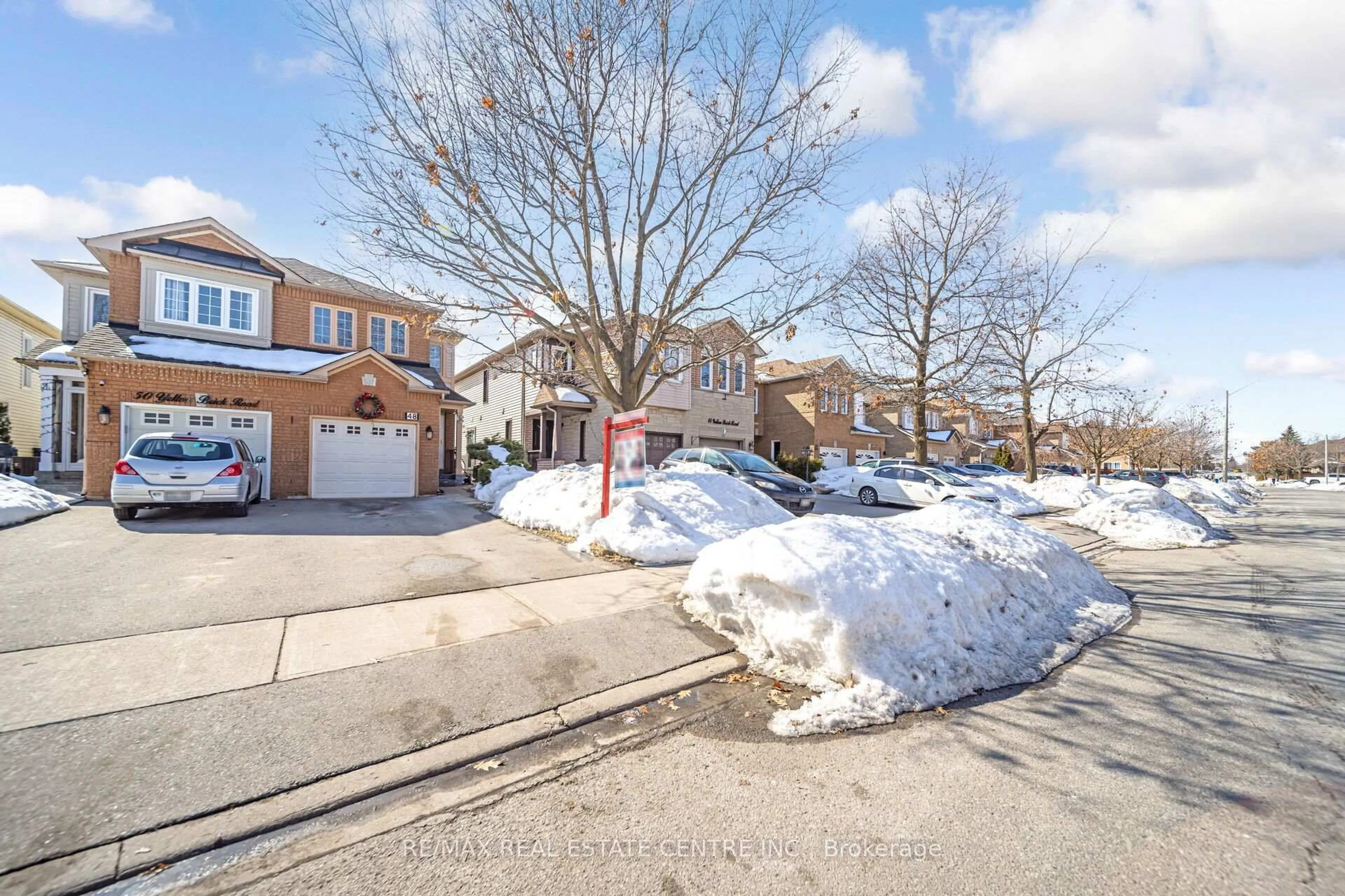 A pic from outside/outdoor area/front of a property/back of a property/a pic from drone, street for 48 Yellow Brick Rd, Brampton Ontario L6V 4L1
