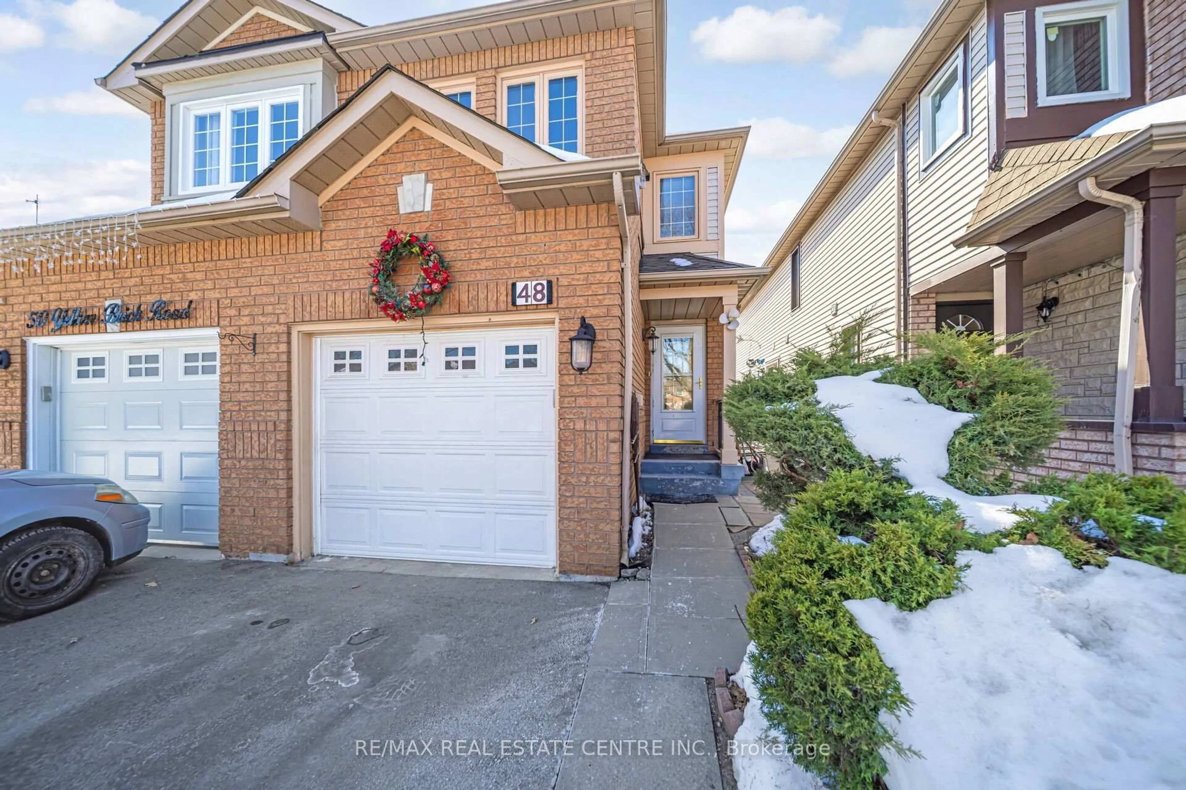Home with brick exterior material, street for 48 Yellow Brick Rd, Brampton Ontario L6V 4L1