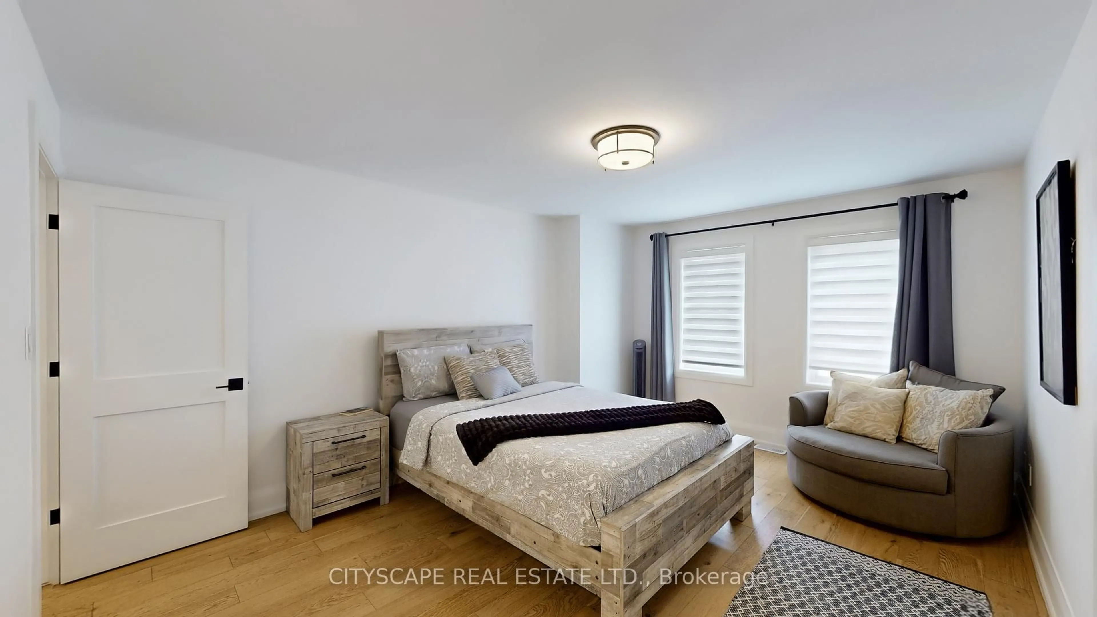 Bedroom with bed, wood/laminate floor for 5966 River Grove Ave, Mississauga Ontario L5M 4Z8