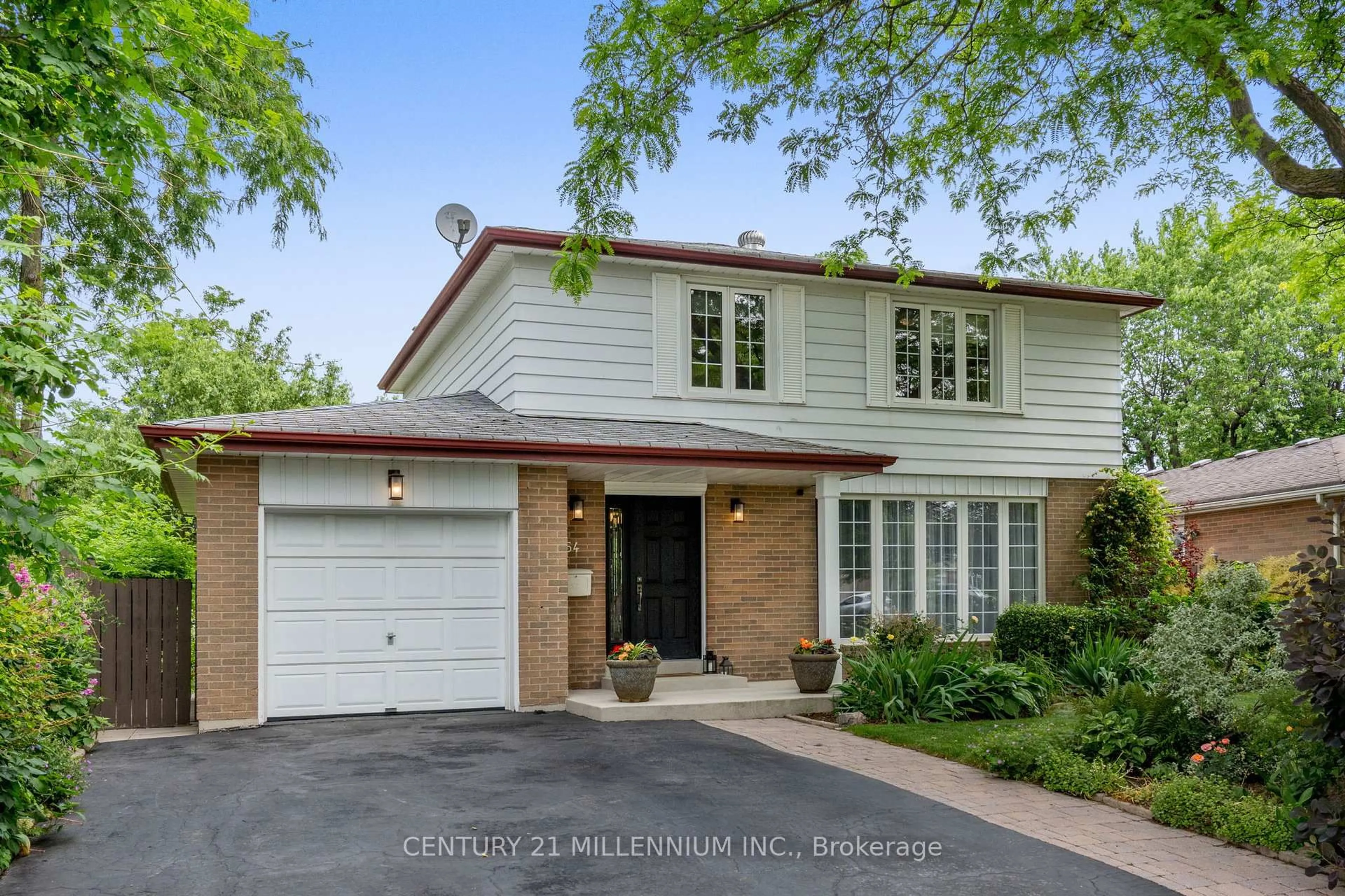 Home with brick exterior material, street for 64 Brookland Dr, Brampton Ontario L6T 2M5