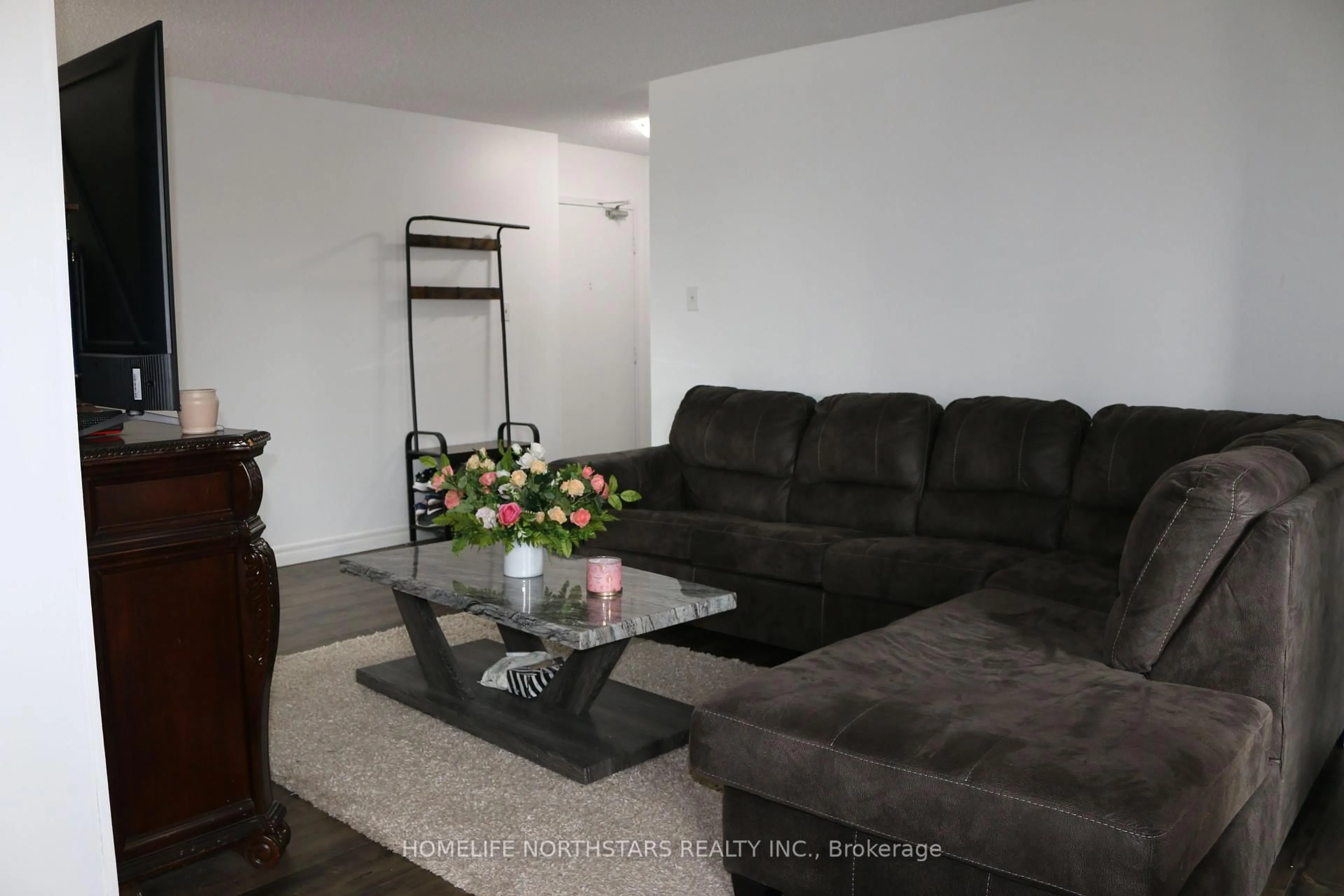 Living room with furniture, unknown for 3 Lisa St #309, Brampton Ontario L6T 4A2