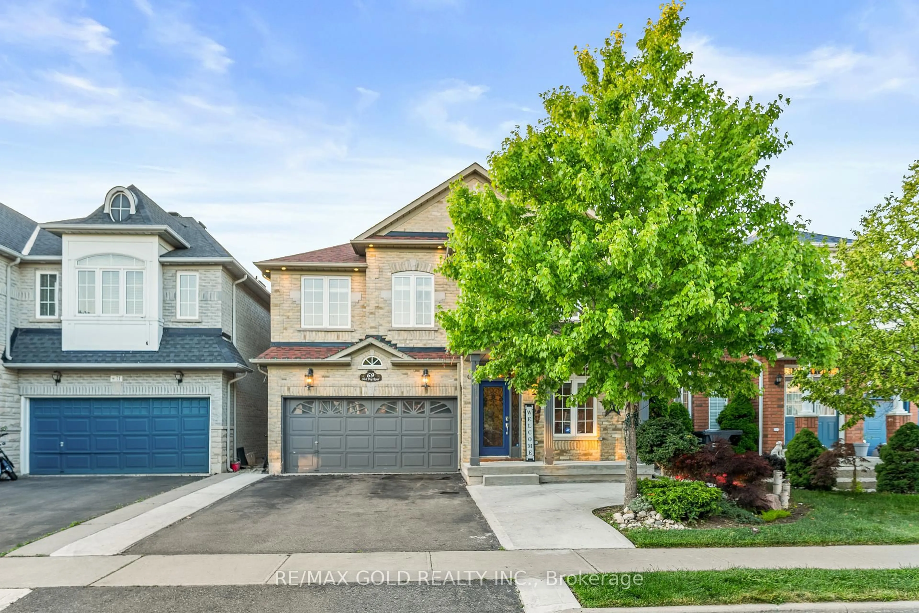 Home with brick exterior material, street for 69 Sled Dog Rd, Brampton Ontario L6R 0J7