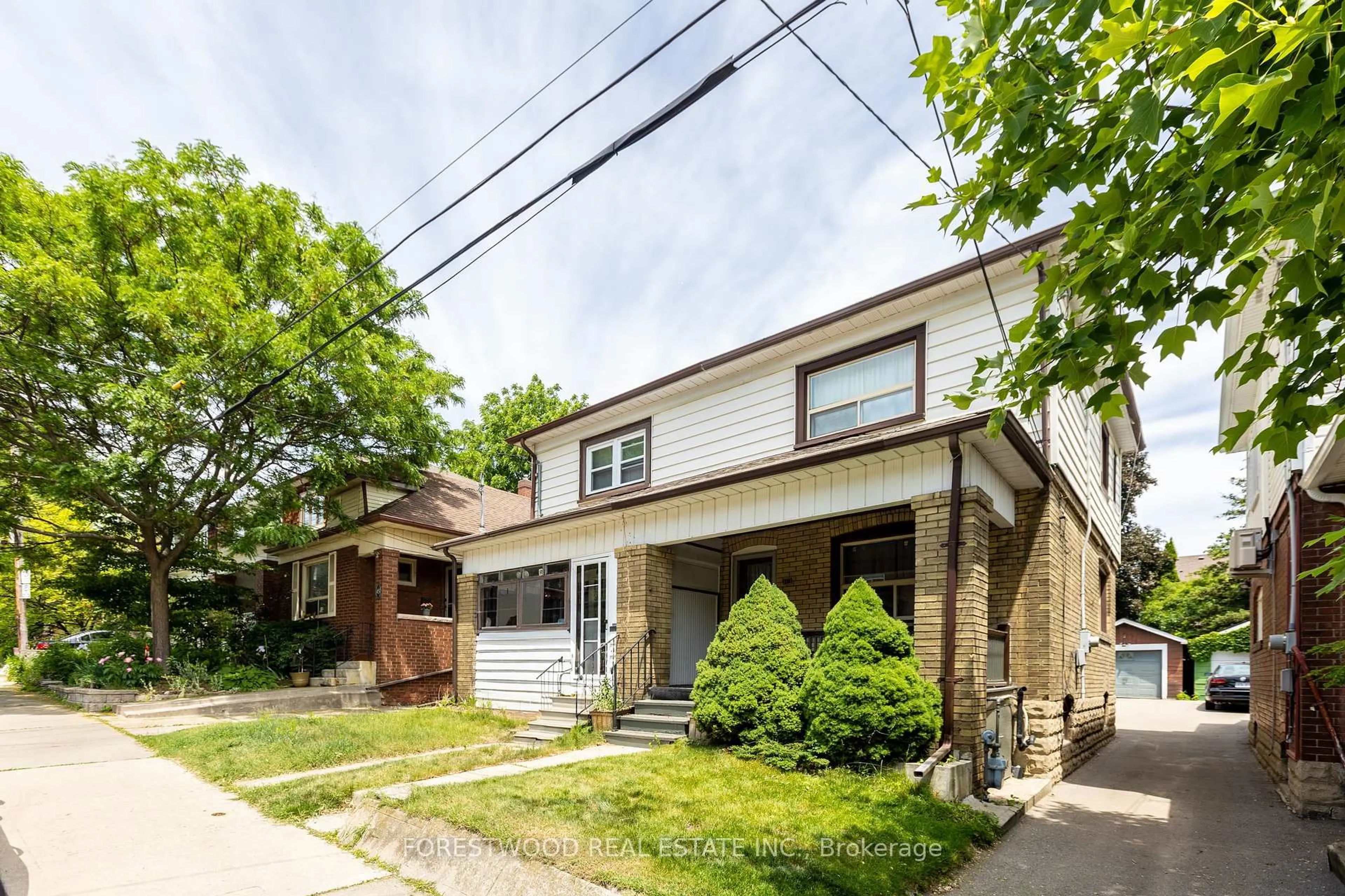Home with brick exterior material, street for 41 Runnymede Rd, Toronto Ontario M6S 2Y1