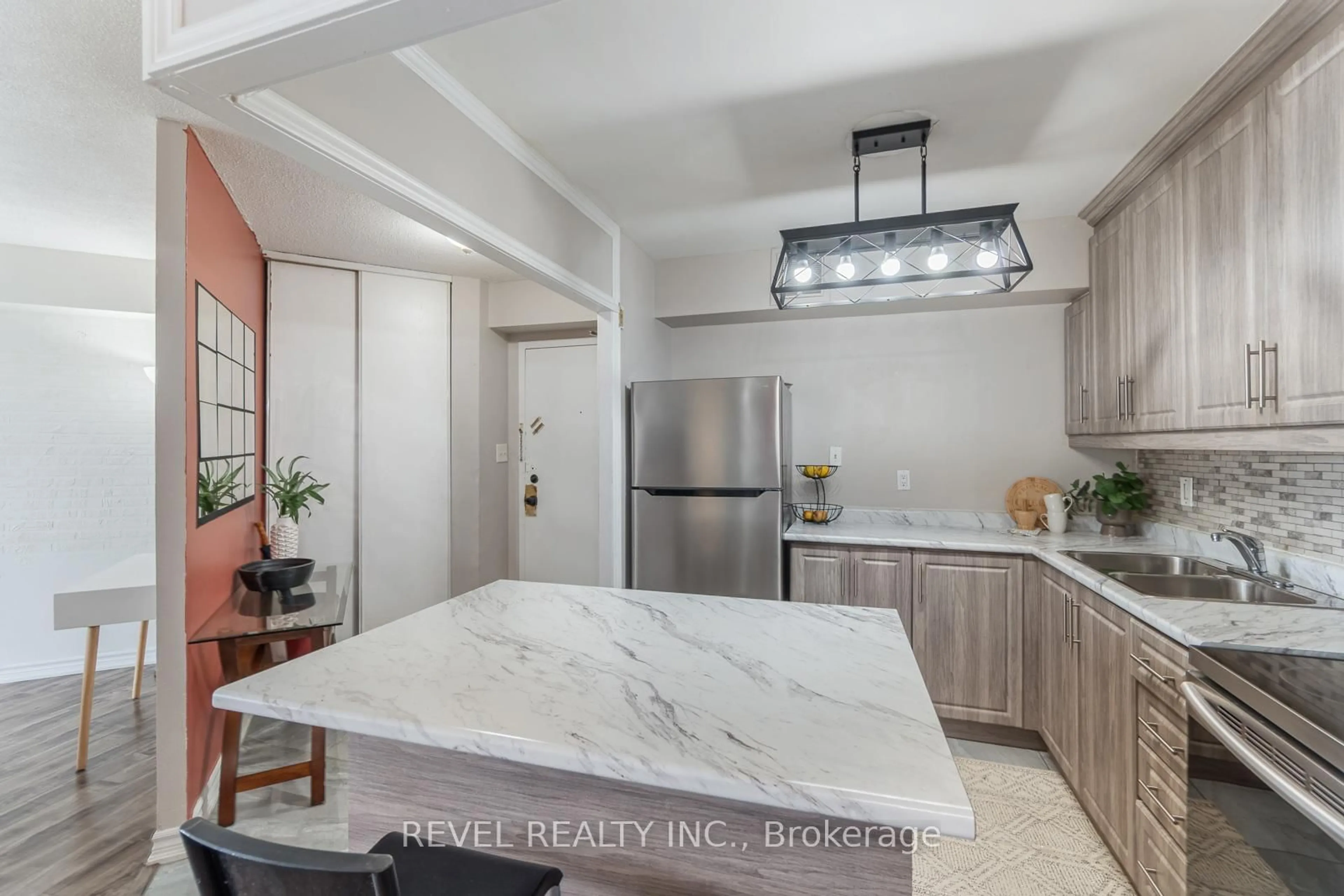 Open concept kitchen, ceramic/tile floor for 330 Dixon Rd #706, Toronto Ontario M9R 1S9
