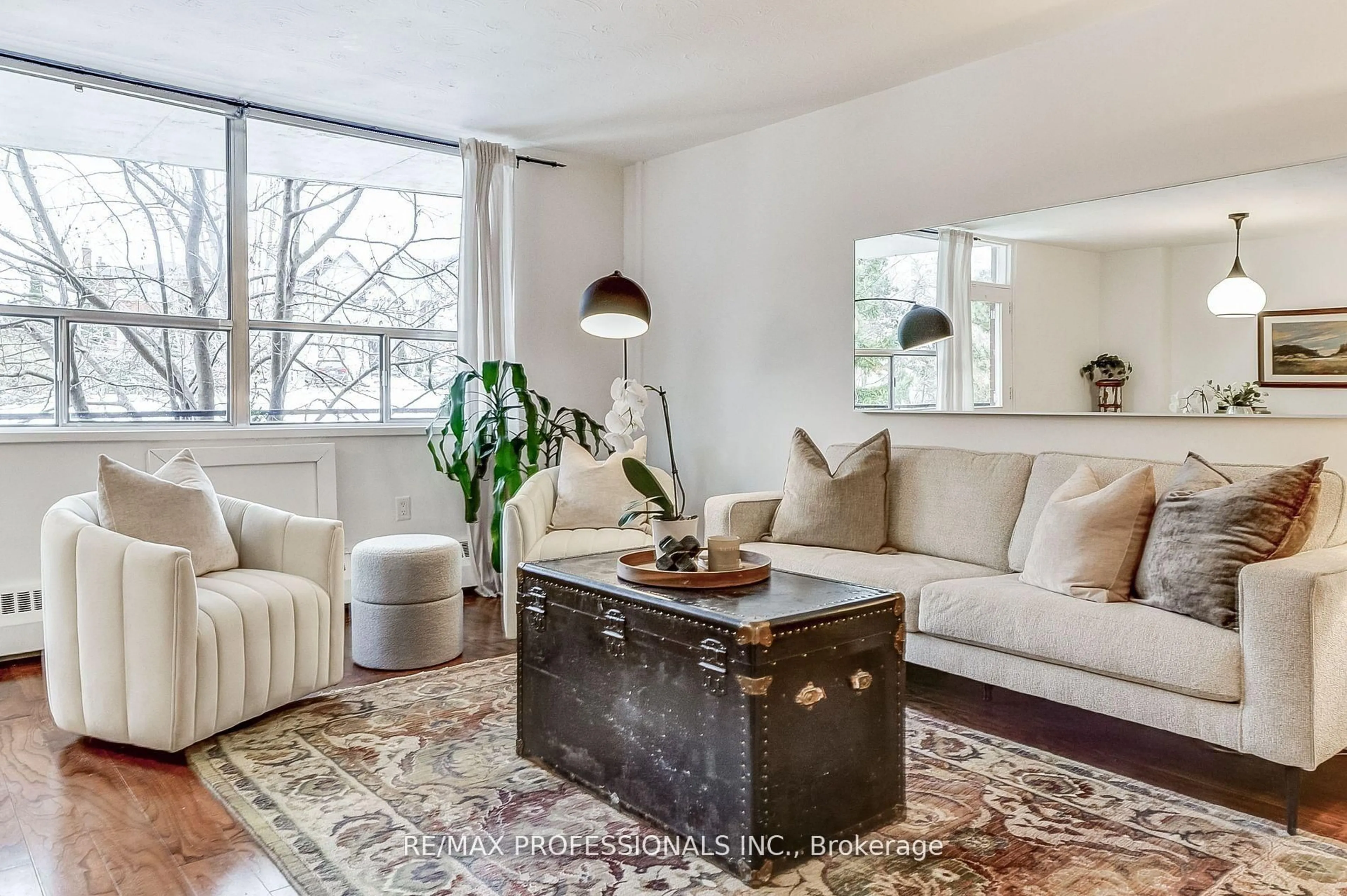 Living room with furniture, unknown for 100 Coe Hill Dr #216, Toronto Ontario M6S 3E1