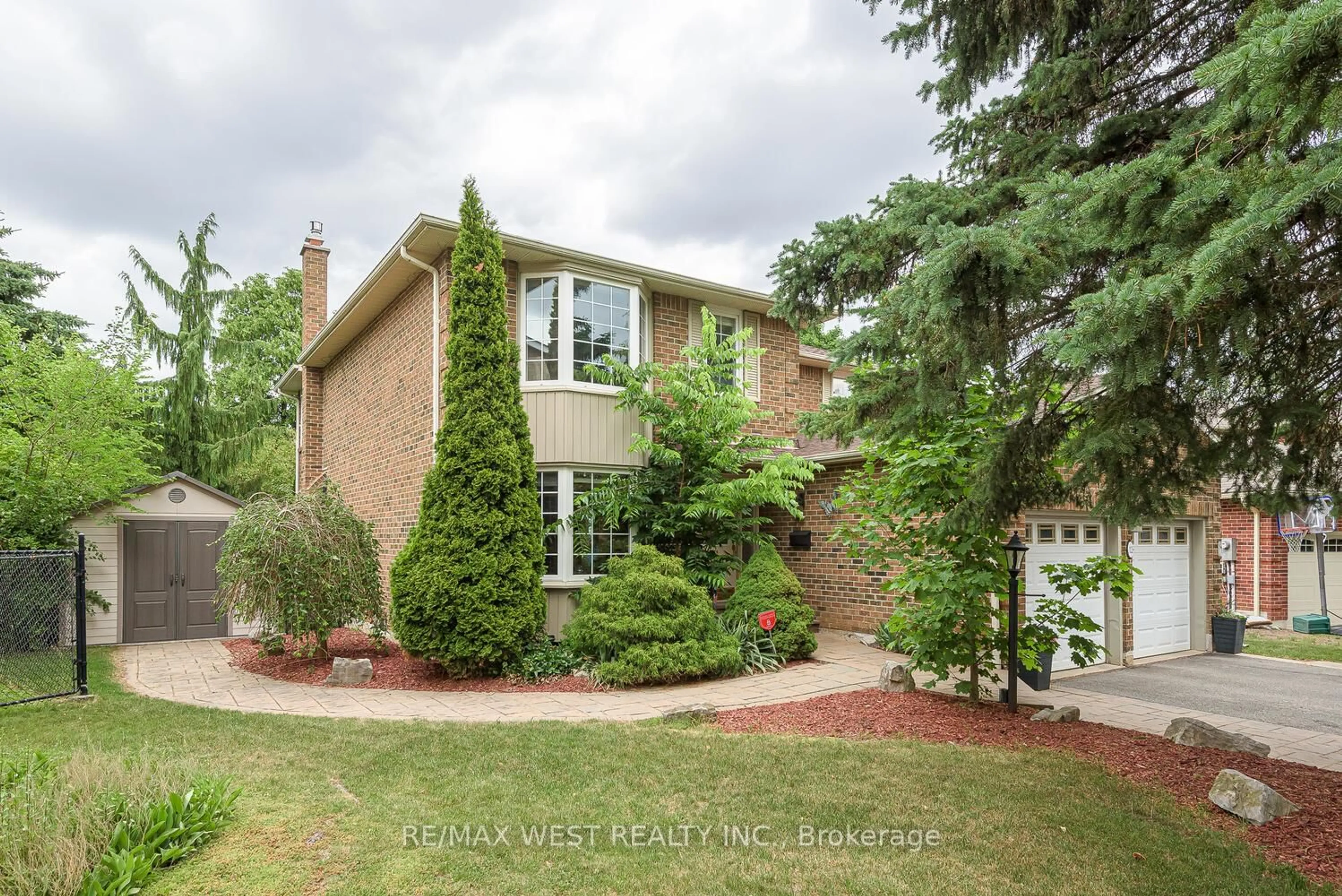 Home with brick exterior material, street for 12 Barr Cres, Brampton Ontario L6Z 3C3