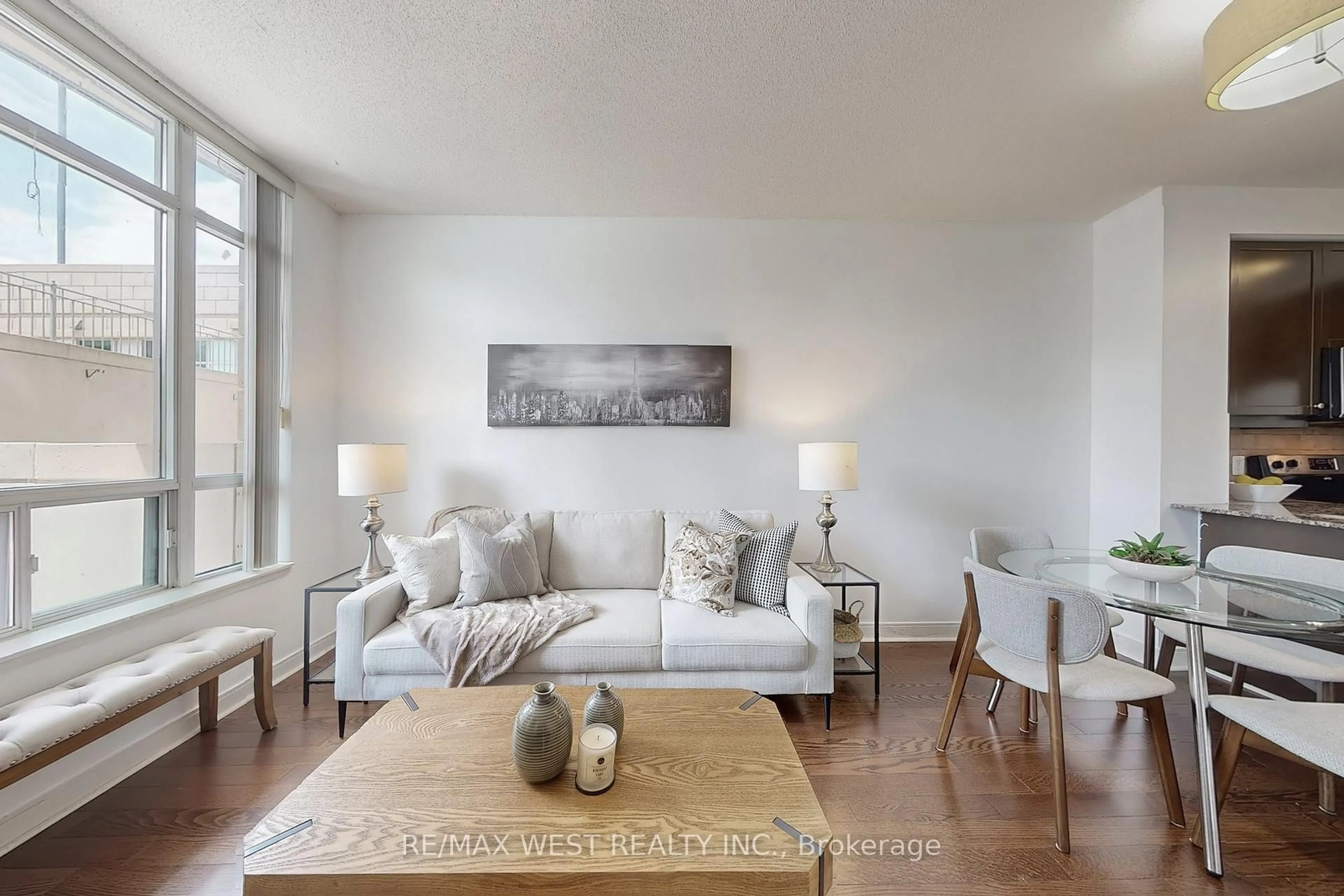 Living room with furniture, unknown for 80 Absolute Ave #206, Mississauga Ontario L4Z 0A8