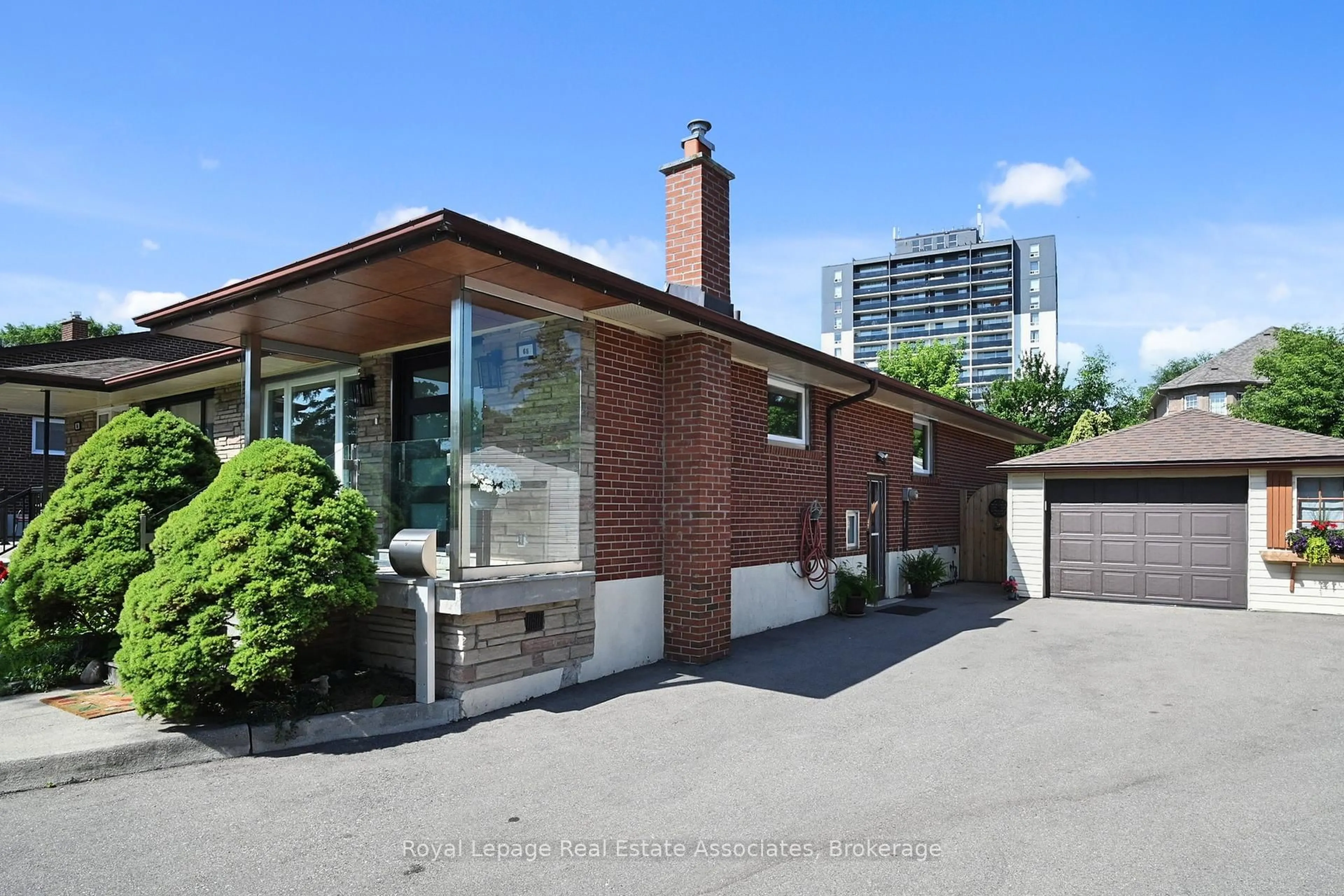 Home with brick exterior material, street for 68 Vanguard Dr, Toronto Ontario M9B 5E6