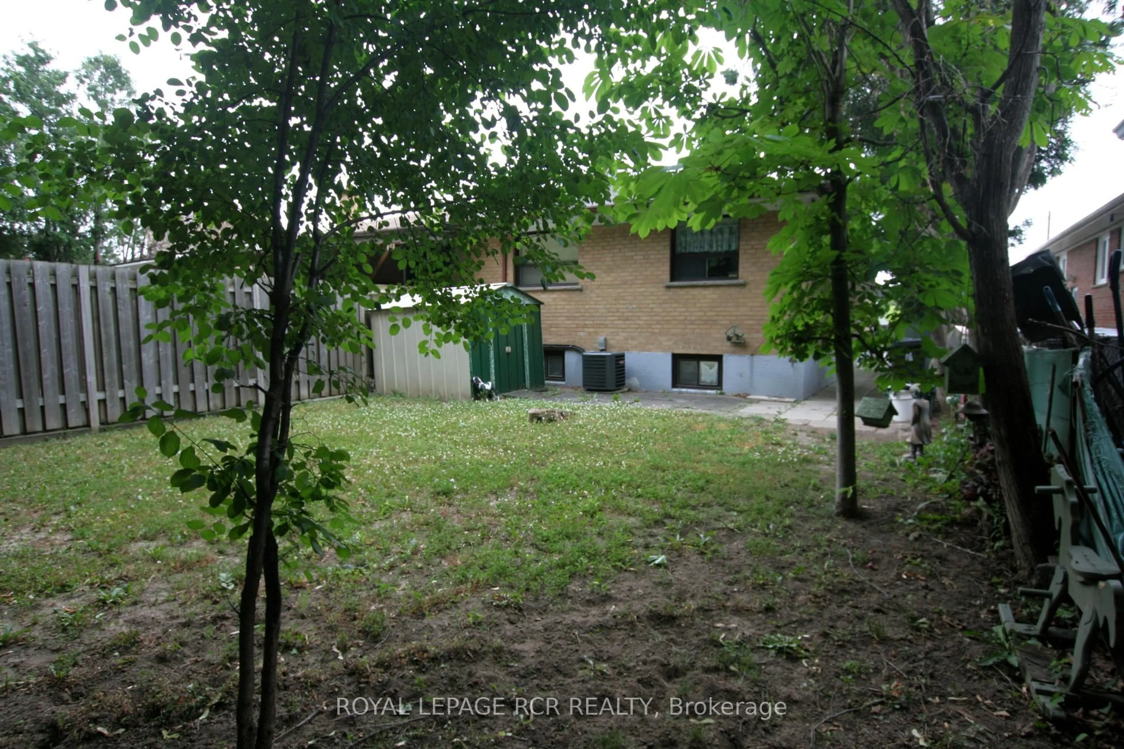 A pic from outside/outdoor area/front of a property/back of a property/a pic from drone, forest/trees view for 69 Neames Cres, Toronto Ontario M3L 1K8
