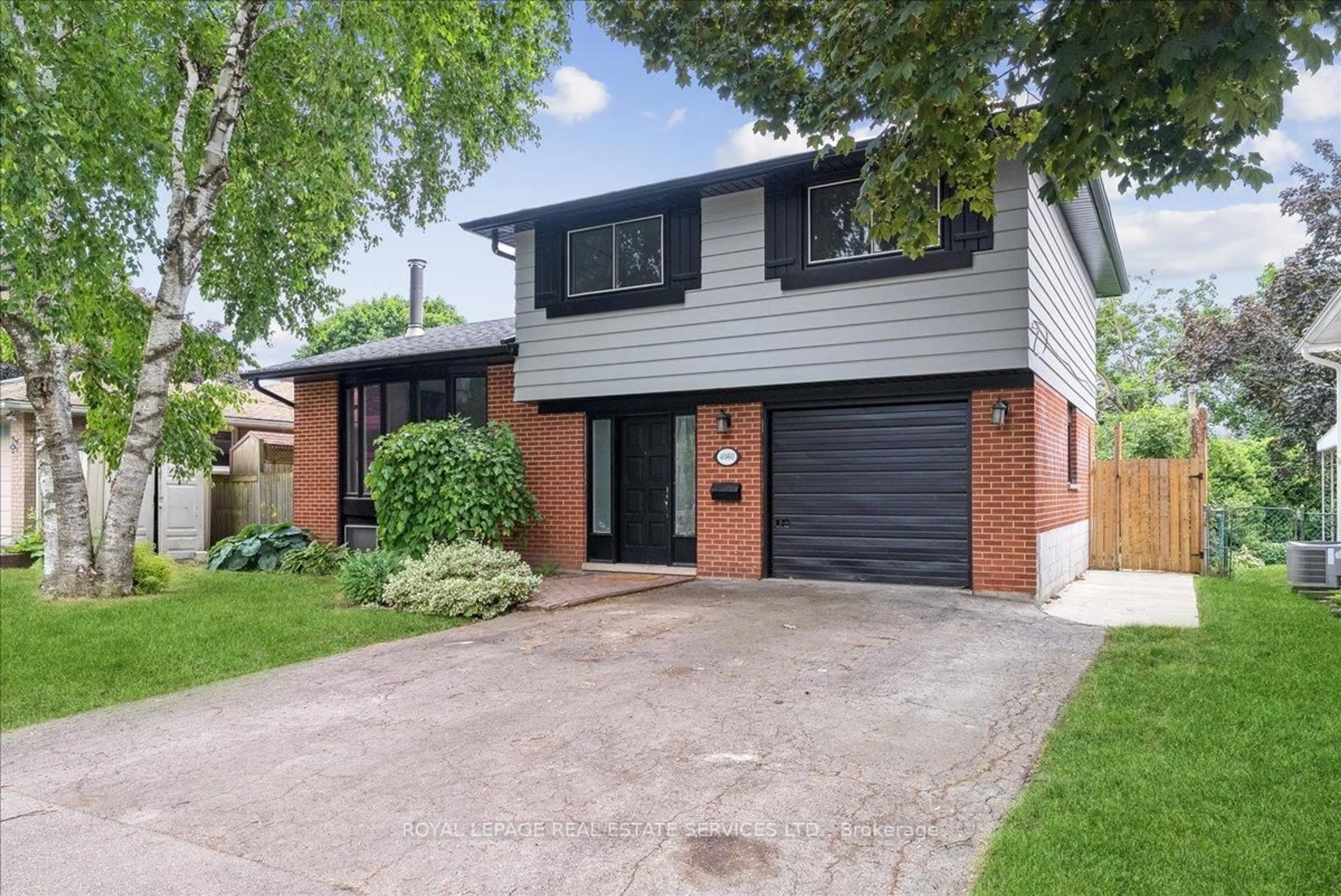 Home with brick exterior material, street for 4060 Flemish Dr, Burlington Ontario L7L 1Z8